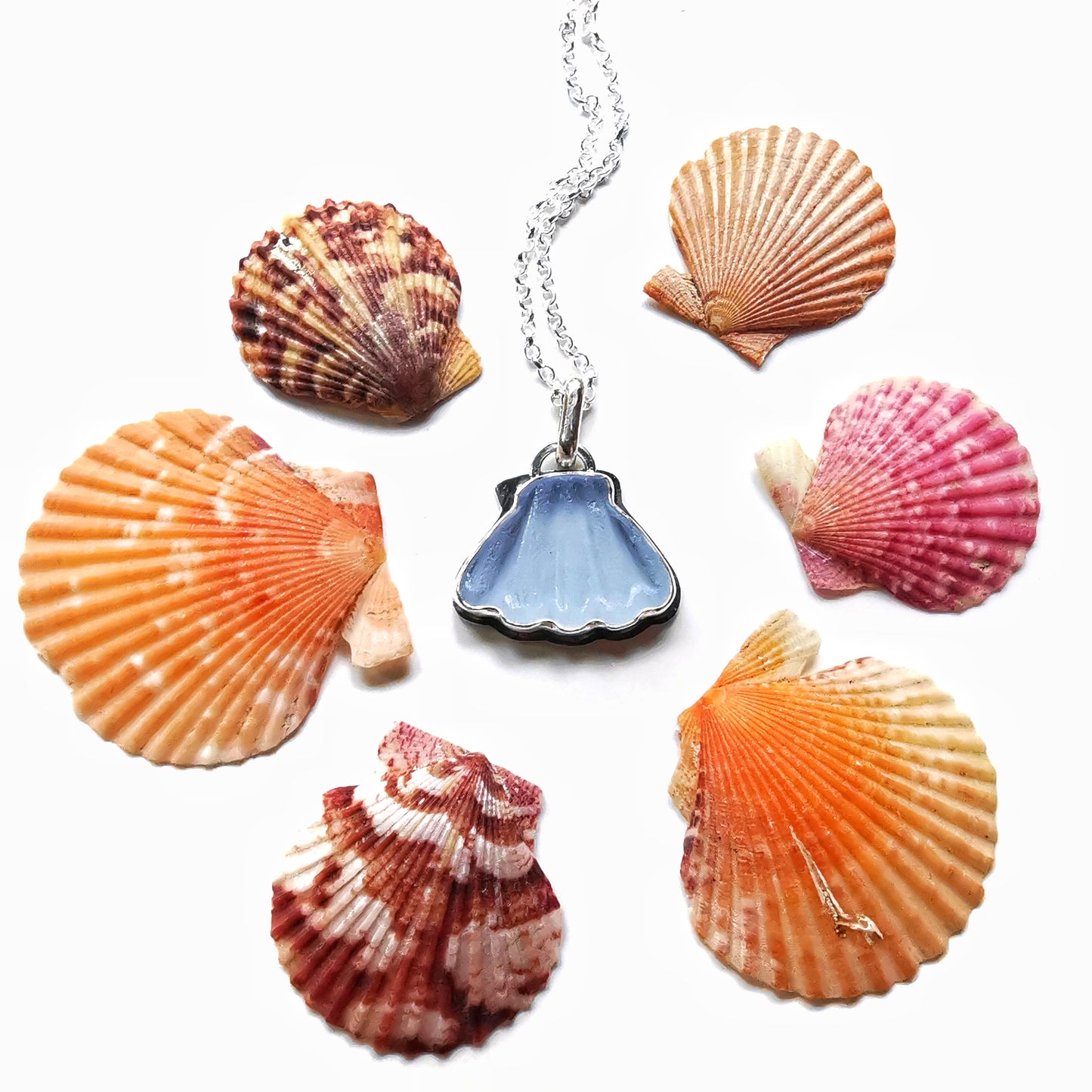 Light blue sea glass shell & sterling silver pendant.