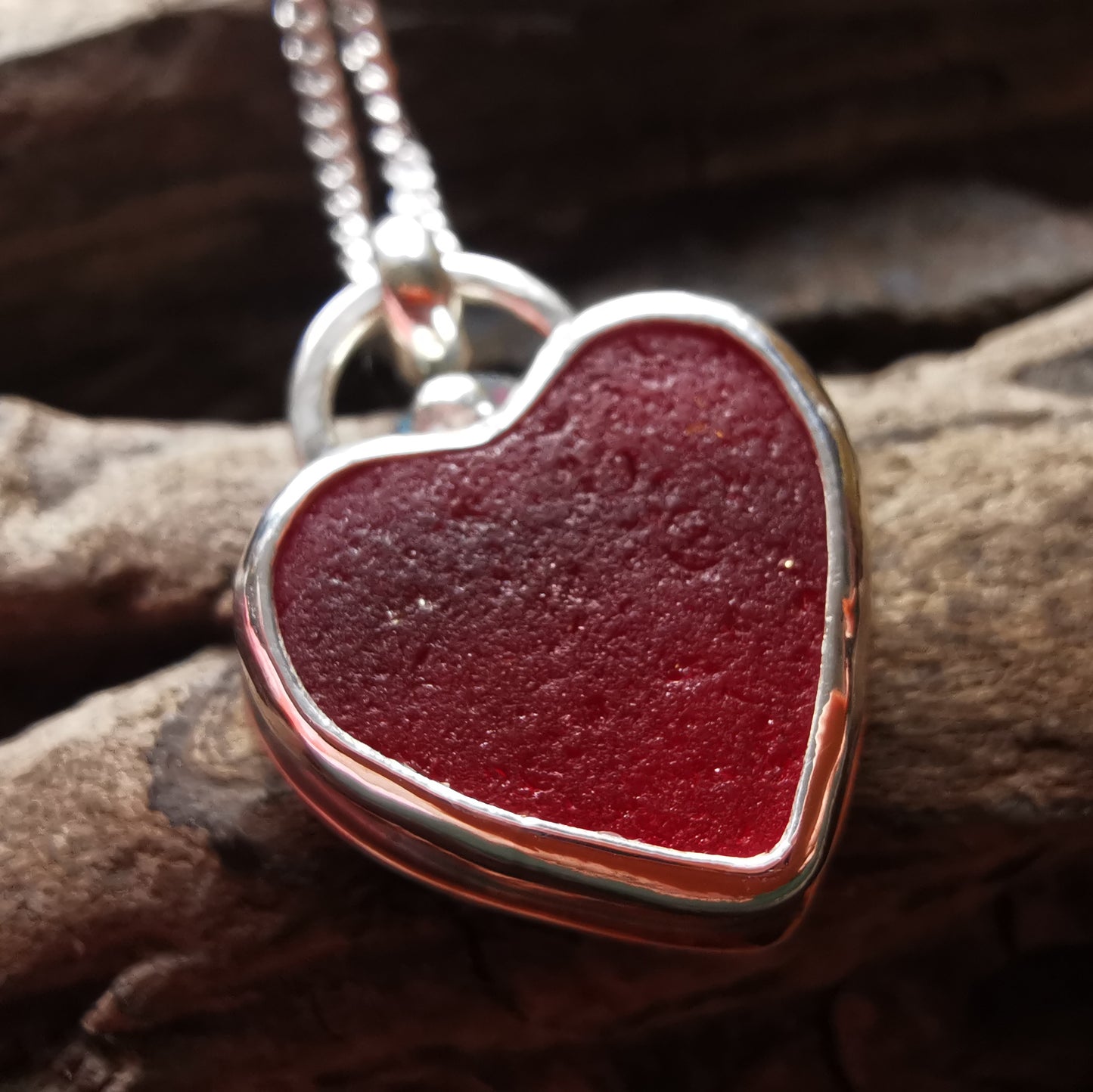 Scottish red sea glass heart & sterling silver pendant.