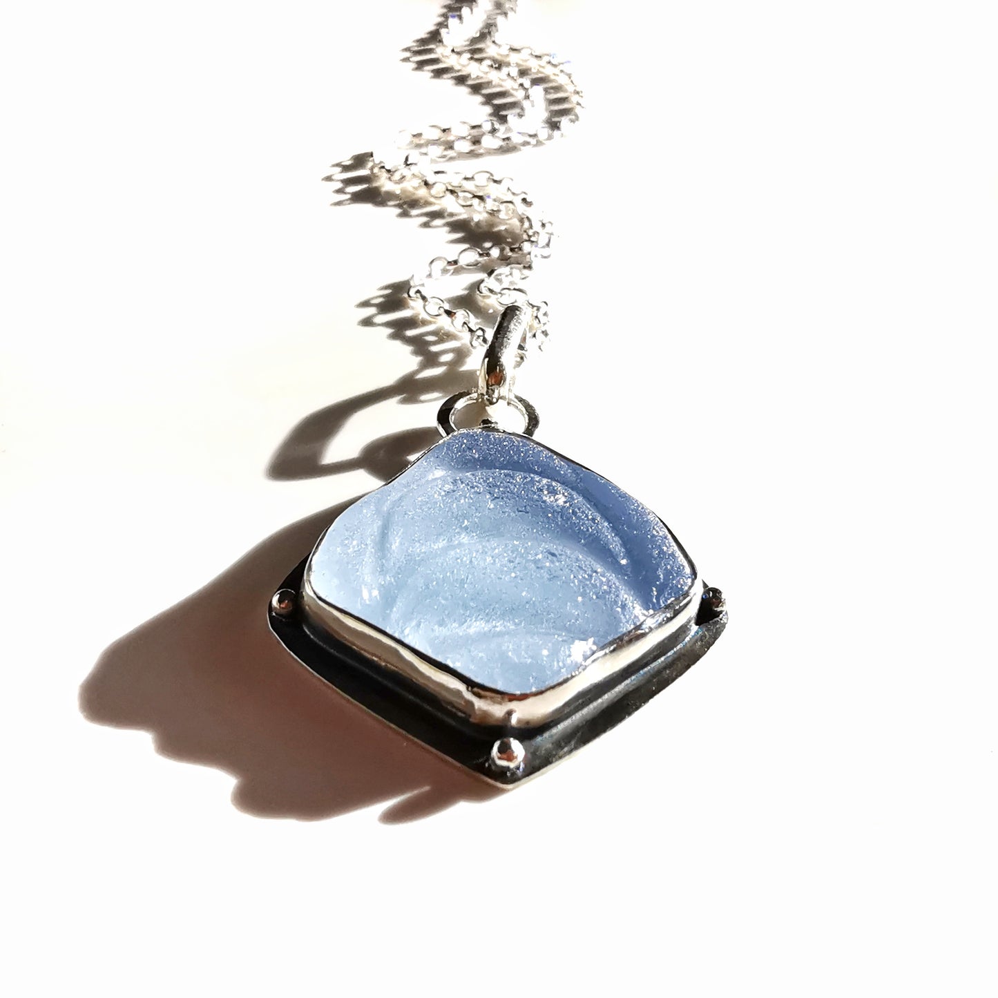 Reserved for Aer. Light blue sea glass moons & sterling silver pendant.