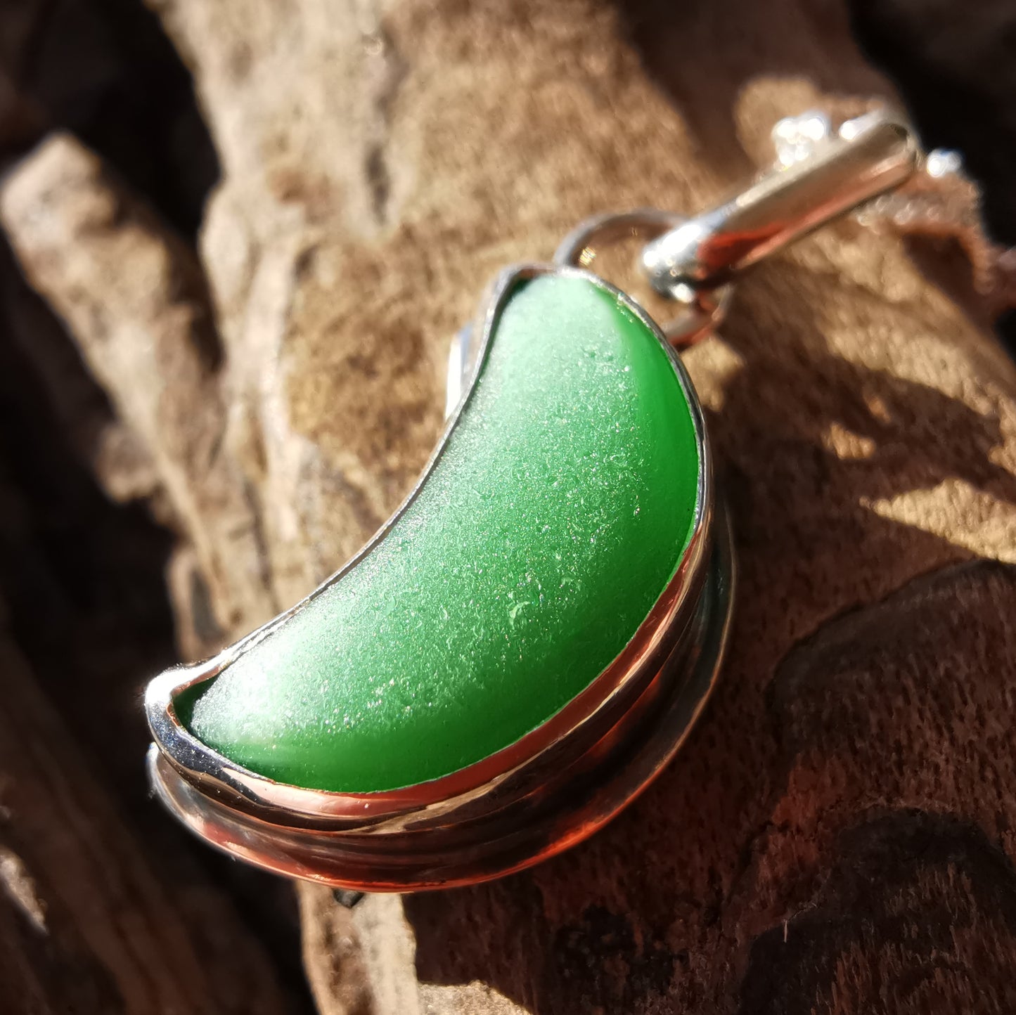 Scottish green crescent moon sea glass & sterling silver pendant.