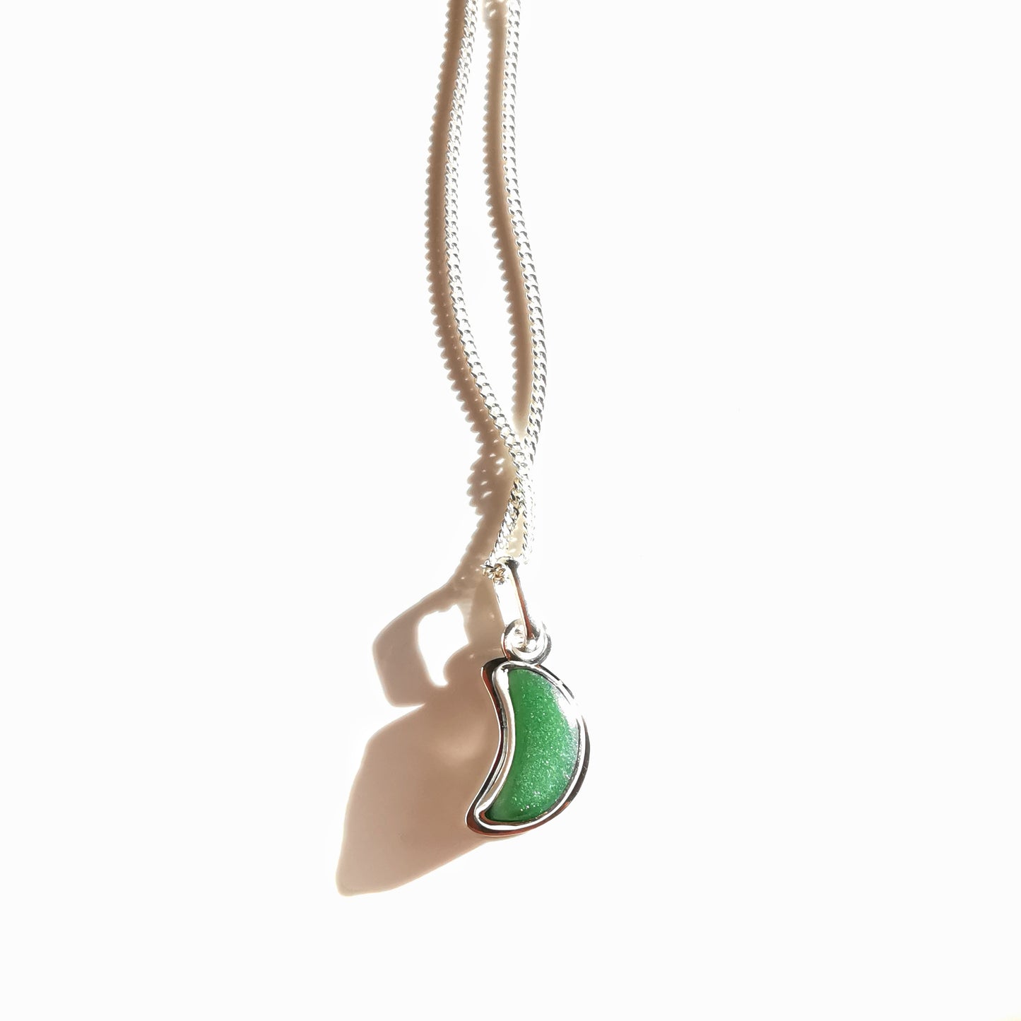 Scottish green crescent moon sea glass & sterling silver pendant.