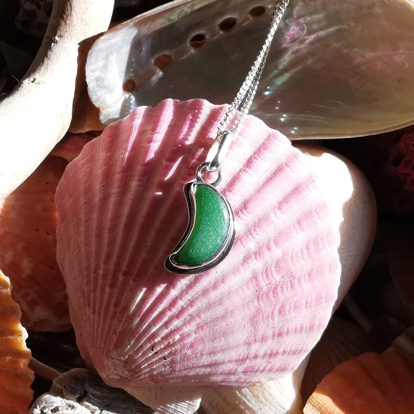 Scottish green crescent moon sea glass & sterling silver pendant.