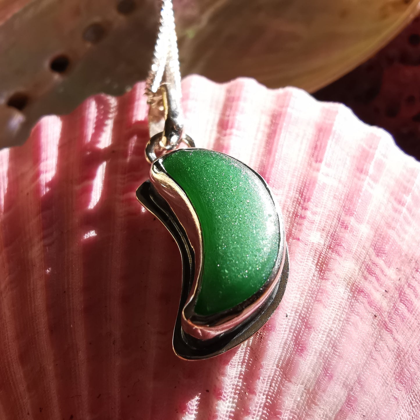 Scottish green crescent moon sea glass & sterling silver pendant.