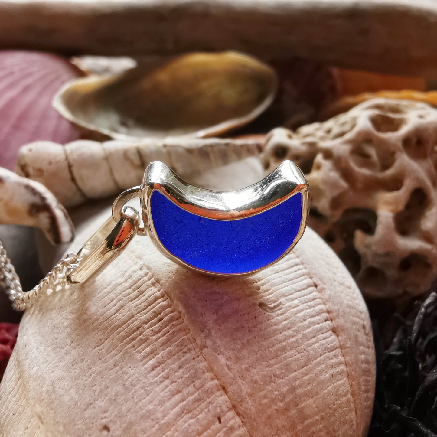 Scottish cobalt blue crescent moon sea glass & sterling silver pendant.