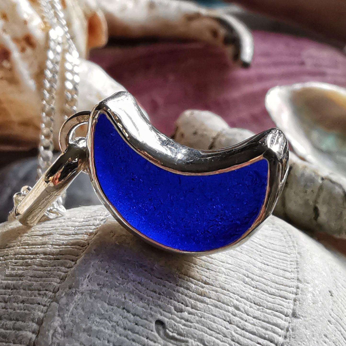 Scottish cobalt blue crescent moon sea glass & sterling silver pendant.