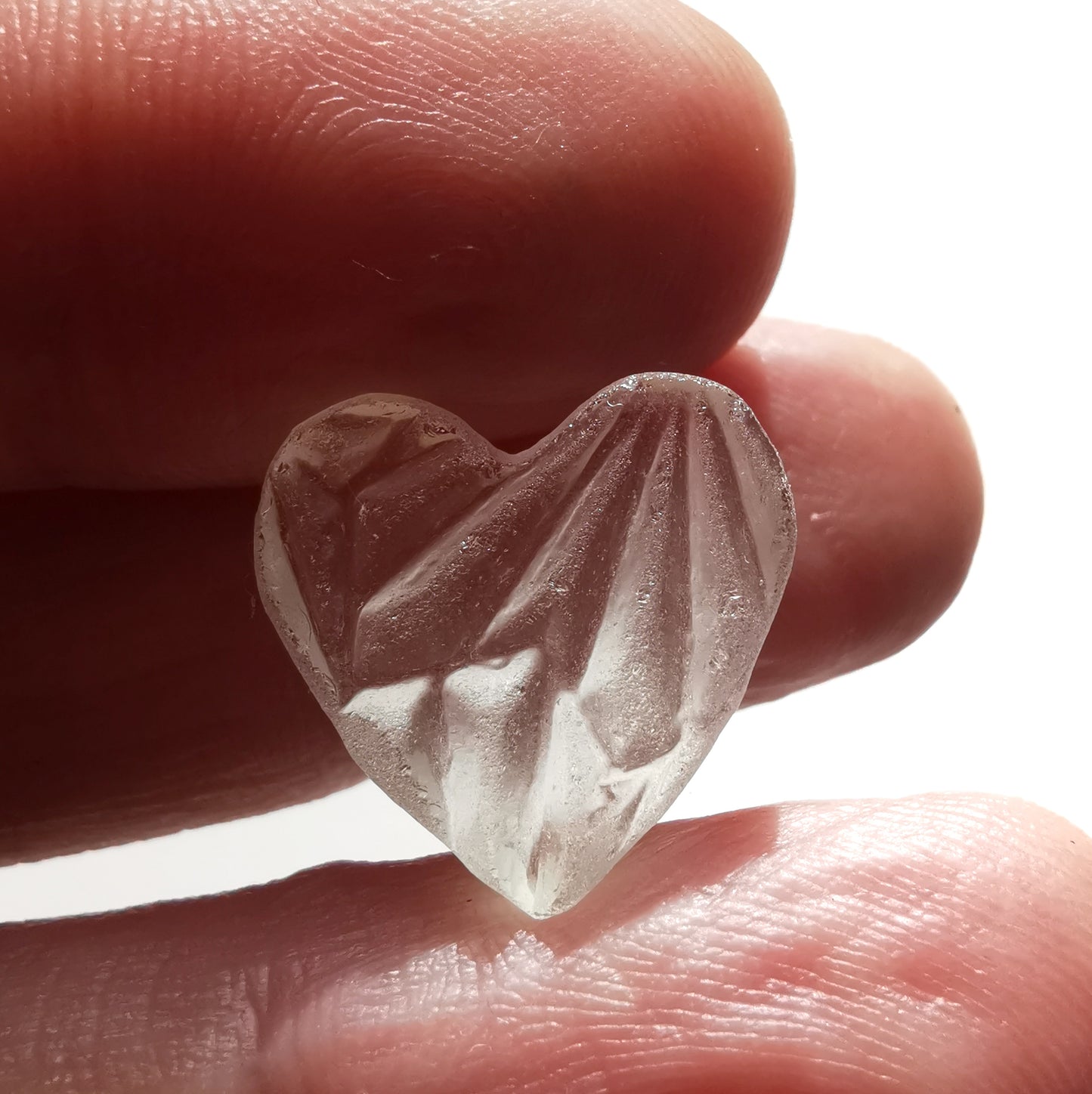 Clear sea glass heart & sterling silver pendant.