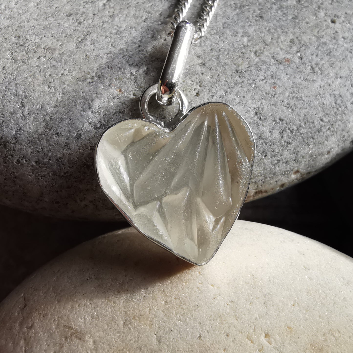 Clear sea glass heart & sterling silver pendant.