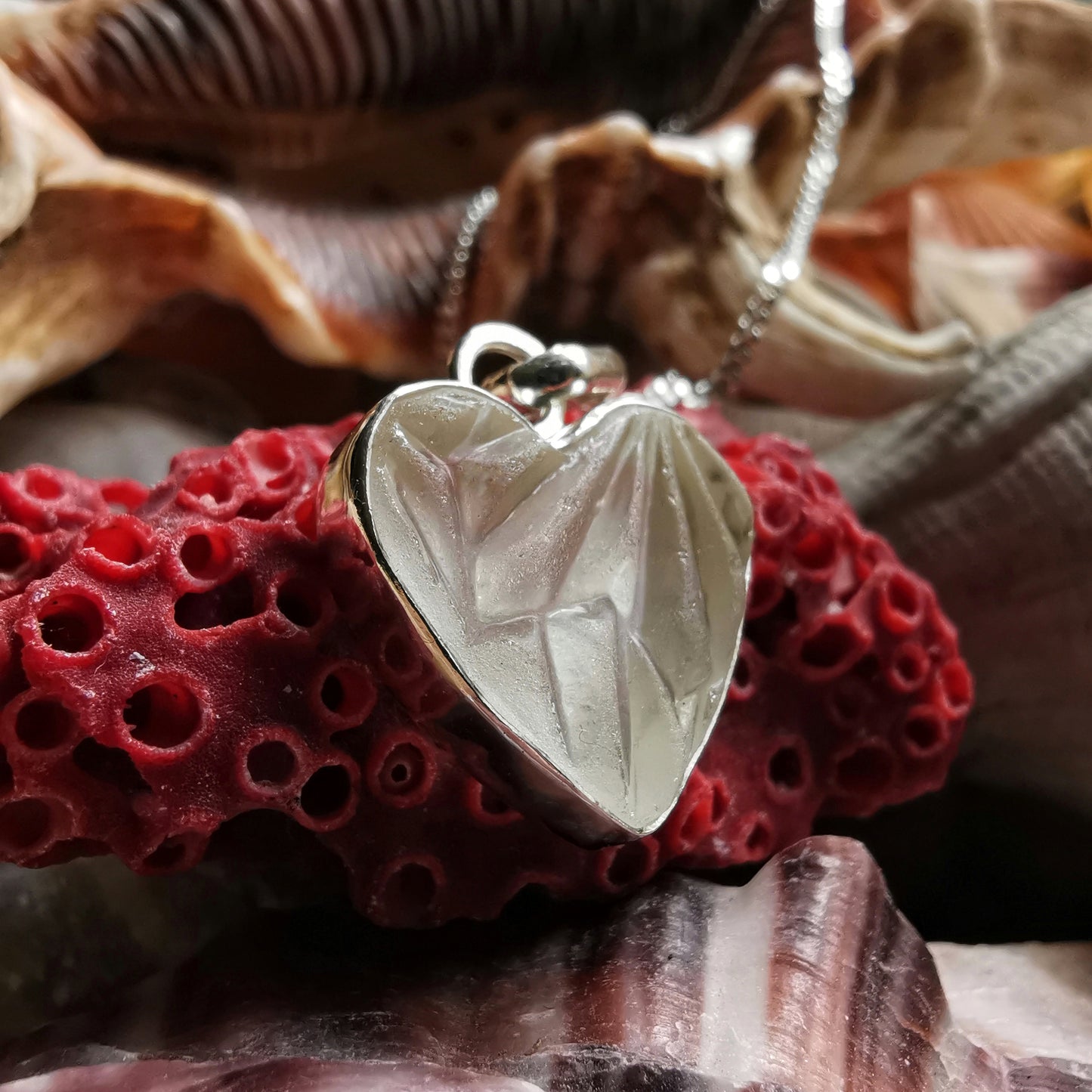 Clear sea glass heart & sterling silver pendant.