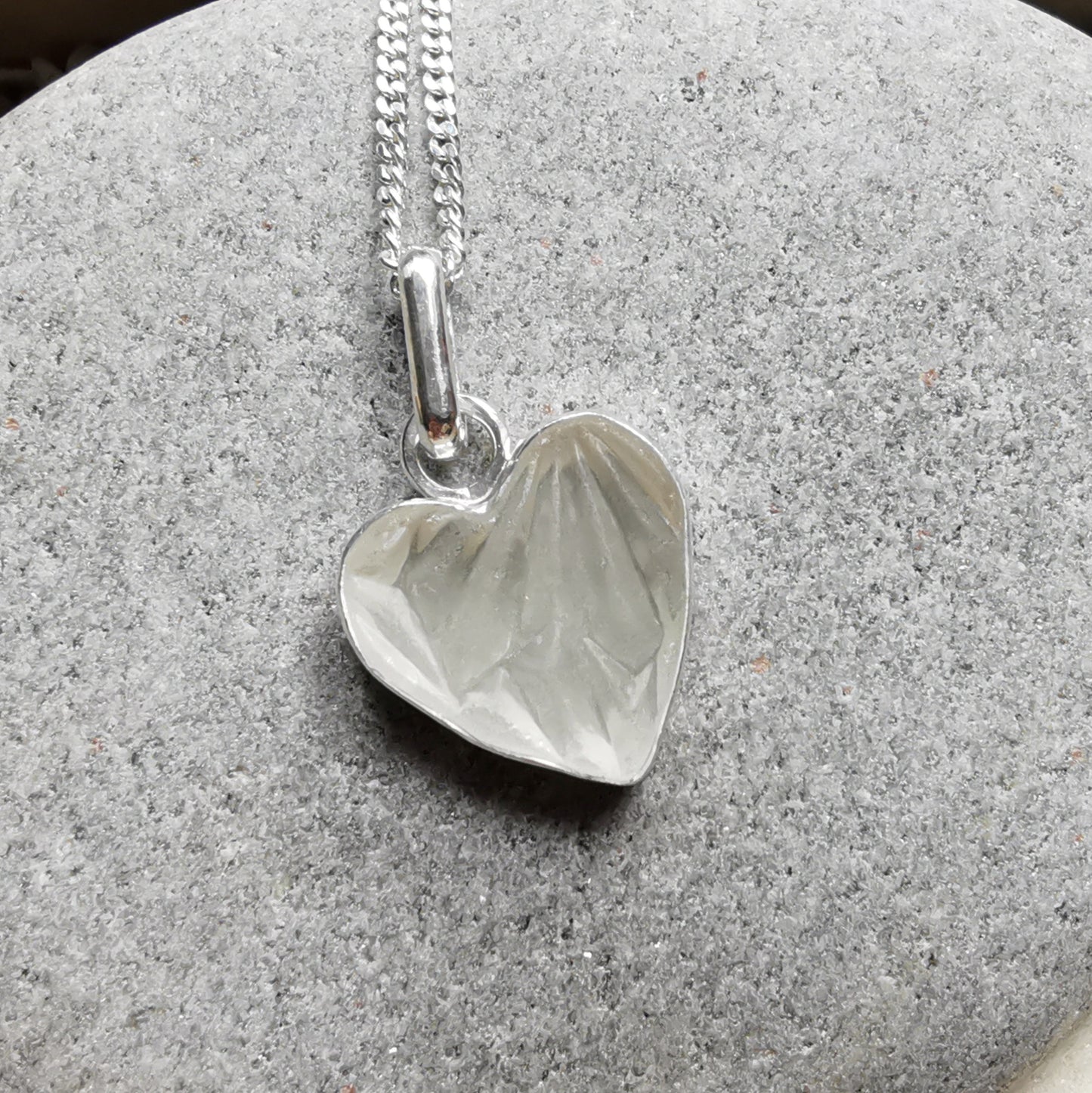 Clear sea glass heart & sterling silver pendant.