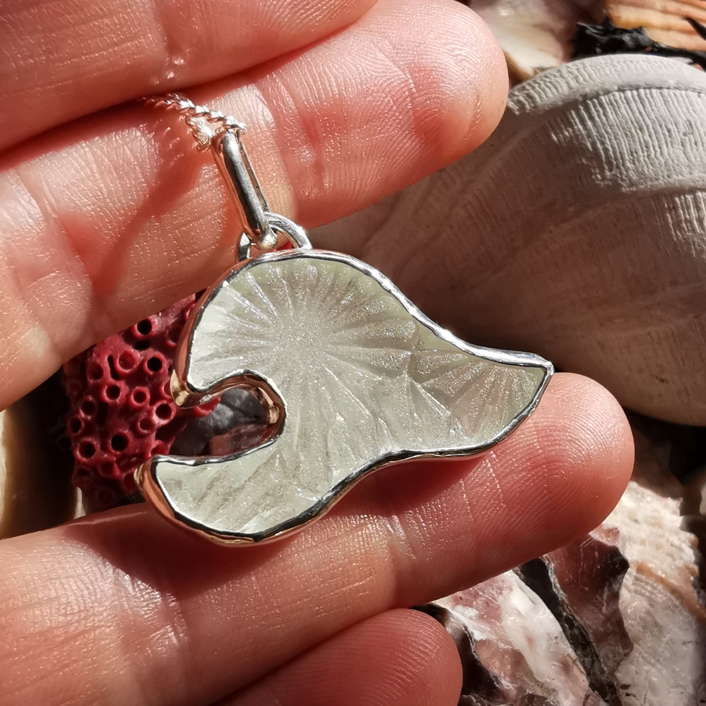 Scottish clear sea glass wave & sterling silver pendant.