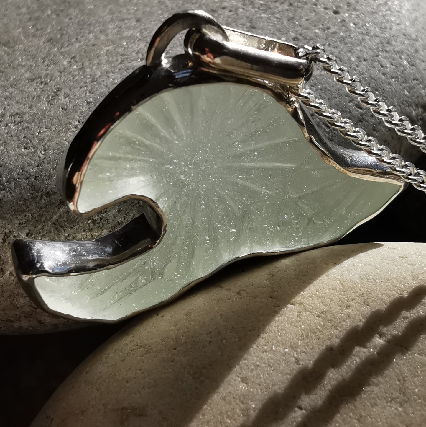 Scottish clear sea glass wave & sterling silver pendant.