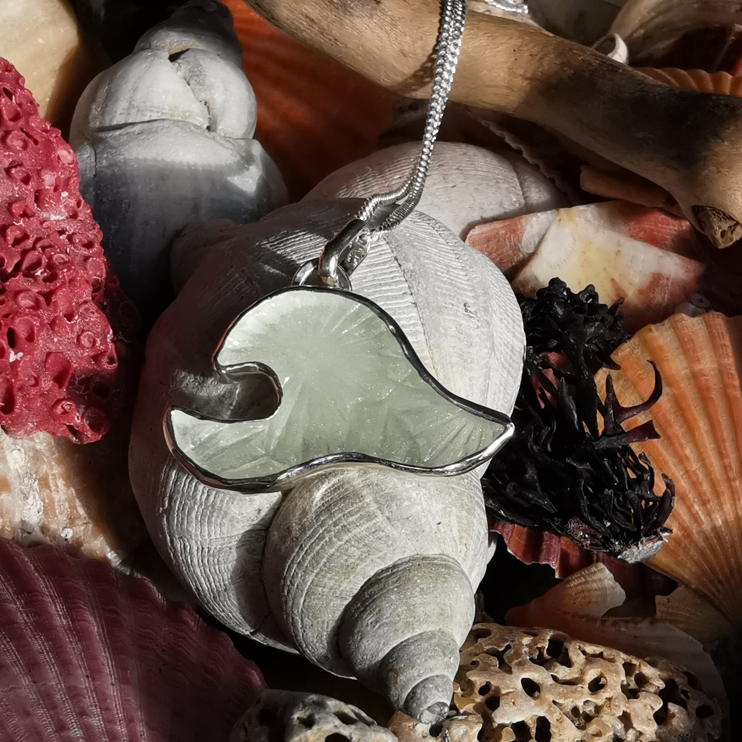 Scottish clear sea glass wave & sterling silver pendant.