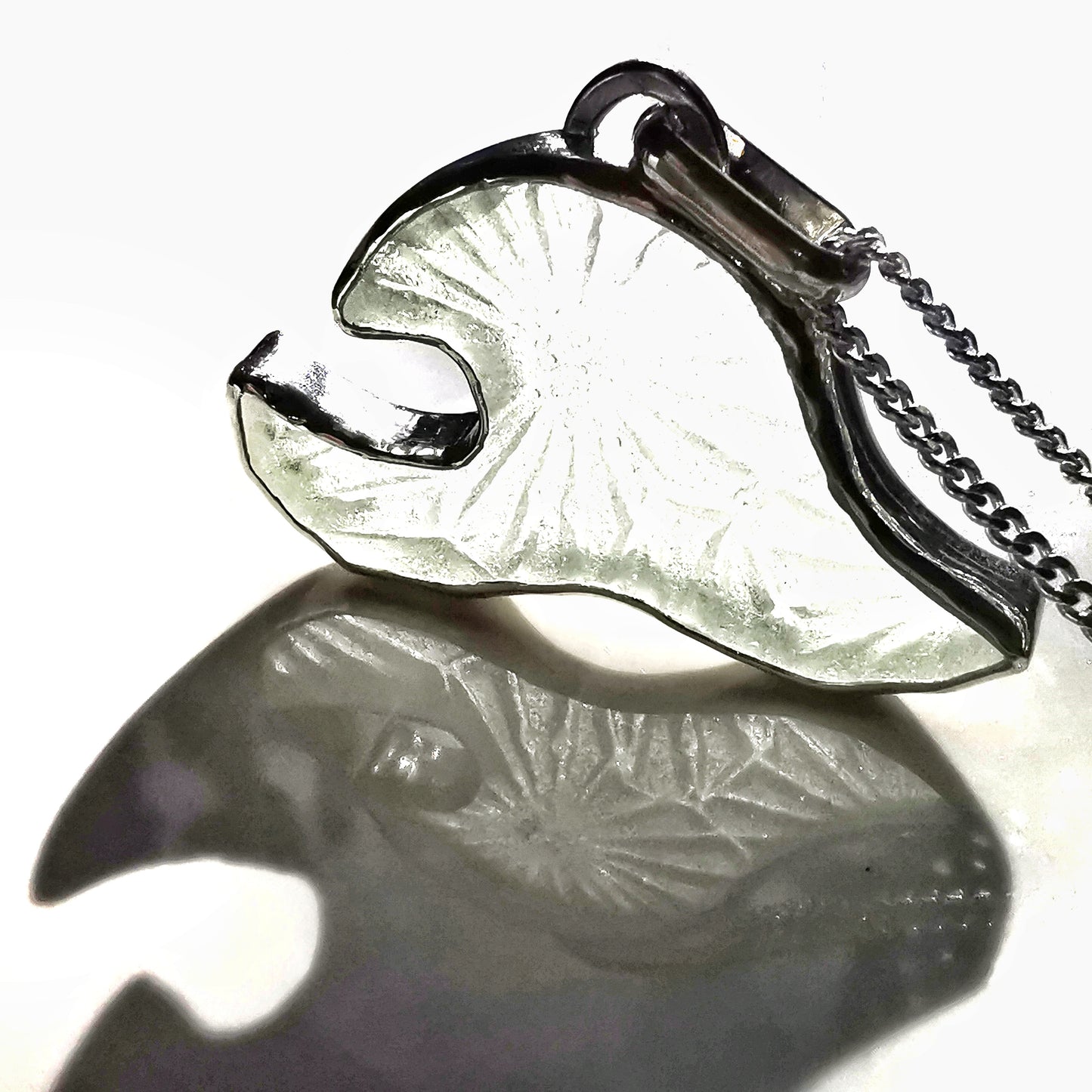 Scottish clear sea glass wave & sterling silver pendant.
