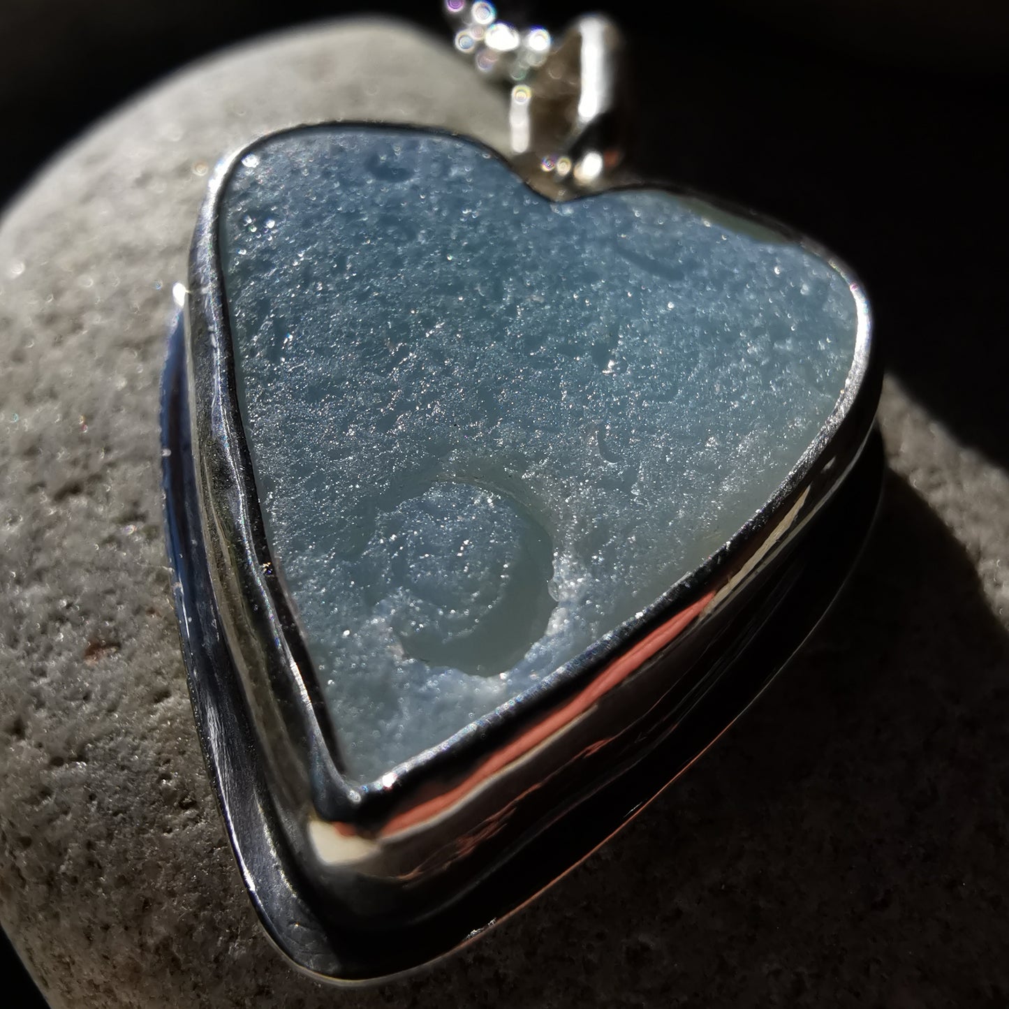 Reserved. Opalescent sea glass heart & sterling silver pendant.