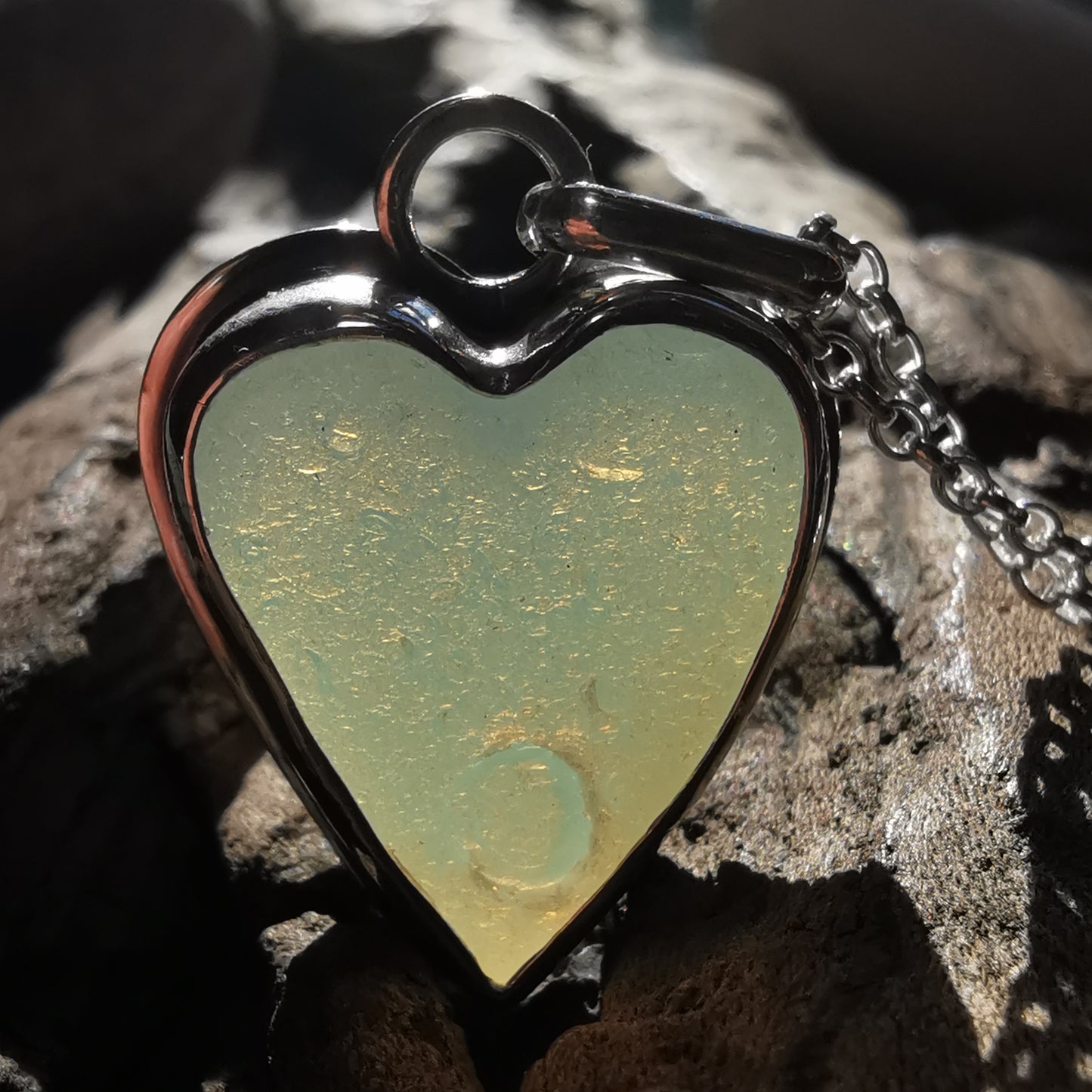 Reserved. Opalescent sea glass heart & sterling silver pendant.