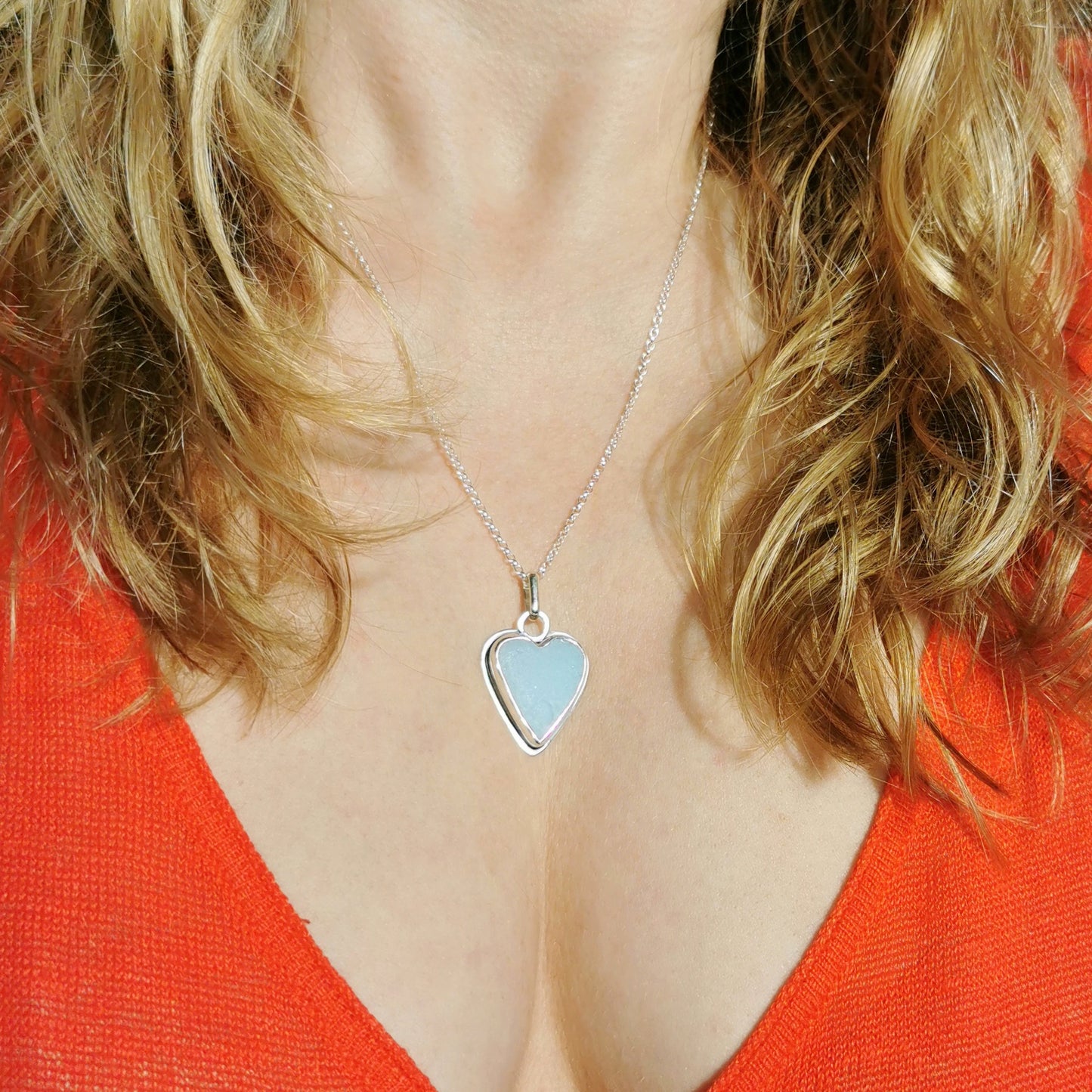 Reserved. Opalescent sea glass heart & sterling silver pendant.
