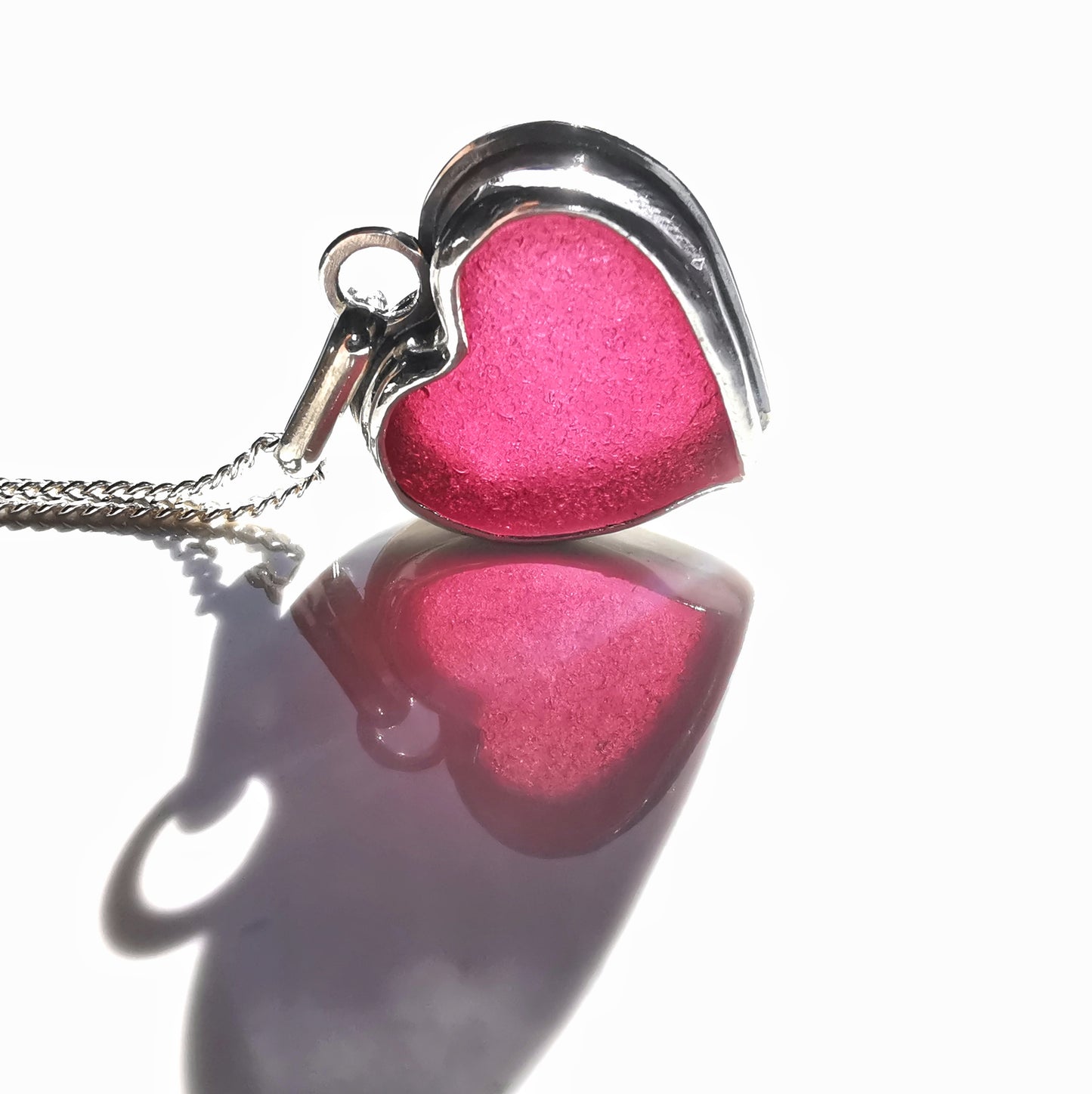 Magenta pink sea glass heart & sterling silver pendant.