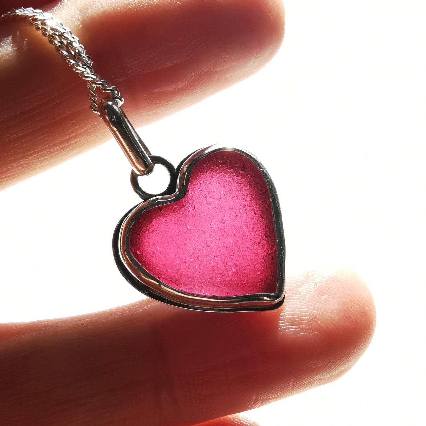 Magenta pink sea glass heart & sterling silver pendant.