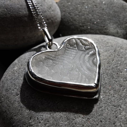 Large clear sea glass heart & sterling silver pendant.