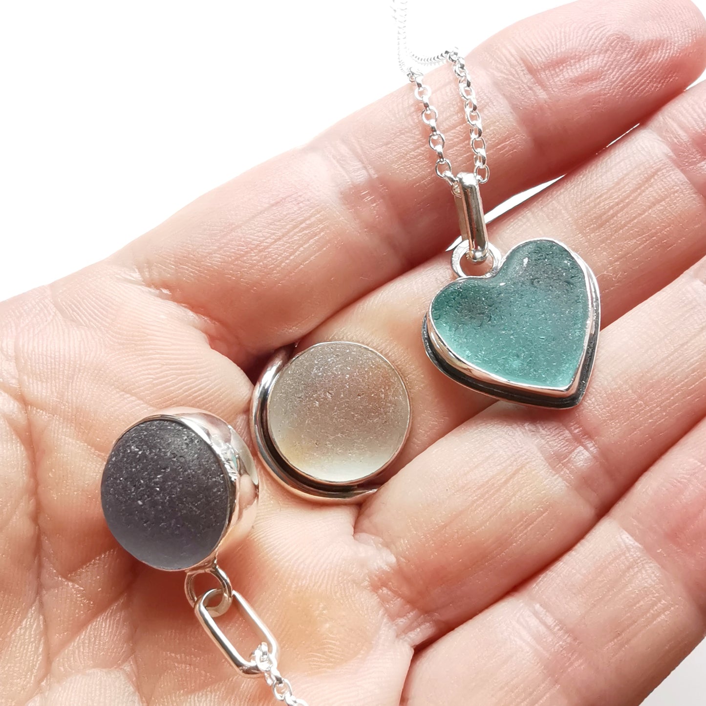 Custom made for Amanda. Sea glass pendants and rings.