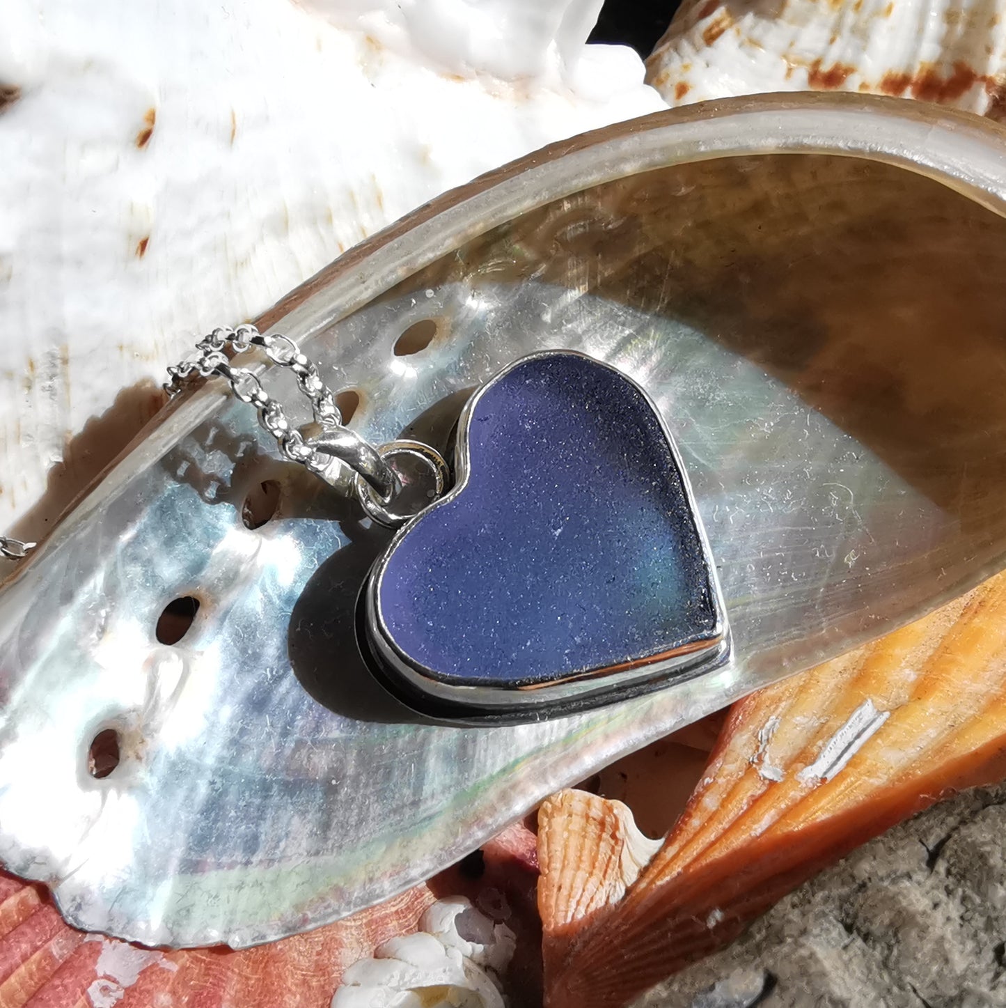 Purple sea glass heart & sterling silver pendant.