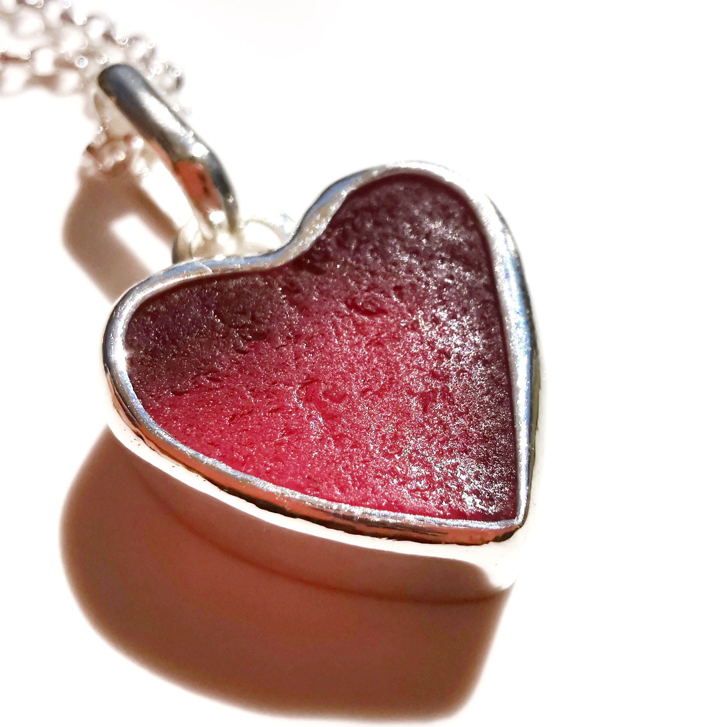 Magenta pink sea glass heart & sterling silver pendant.
