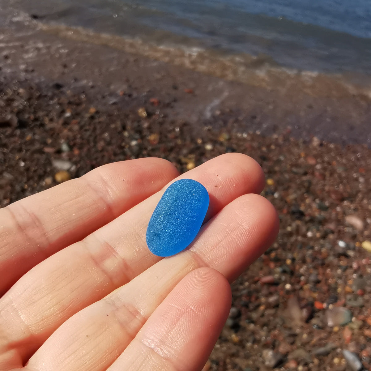 Scottish blue sea glass & sterling silver pendant.