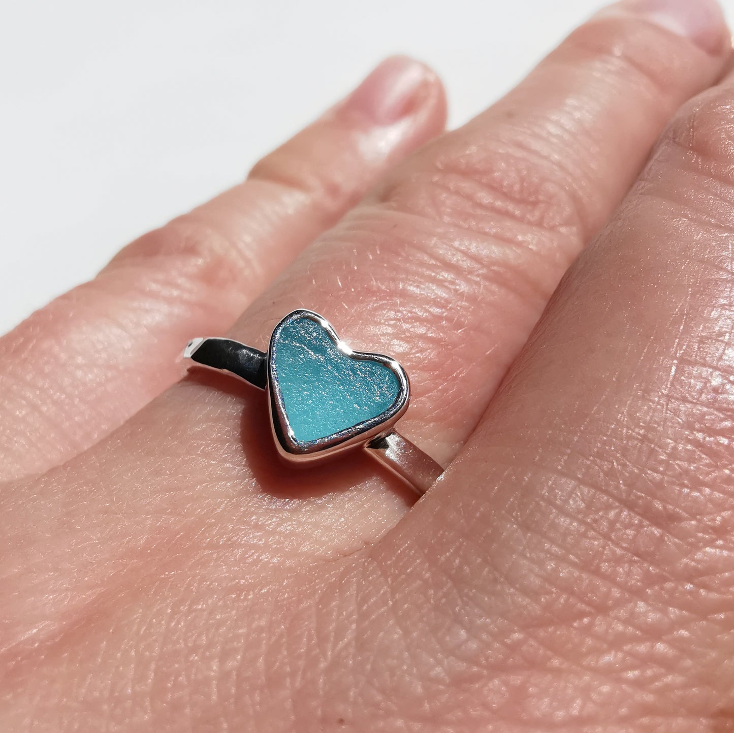 Tiny Scottish aquamarine blue glass heart & sterling silver ring.