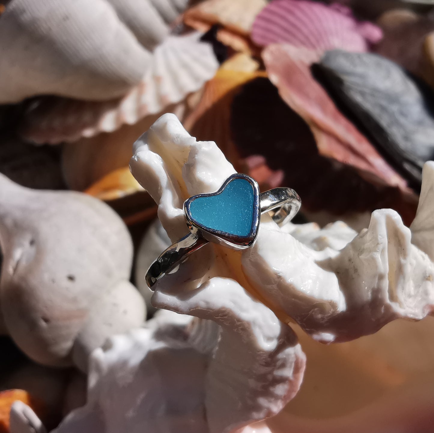 Tiny Scottish aquamarine blue glass heart & sterling silver ring.