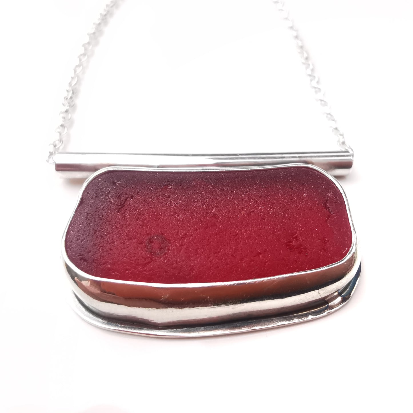 Scottish red sea glass & sterling silver pendant.