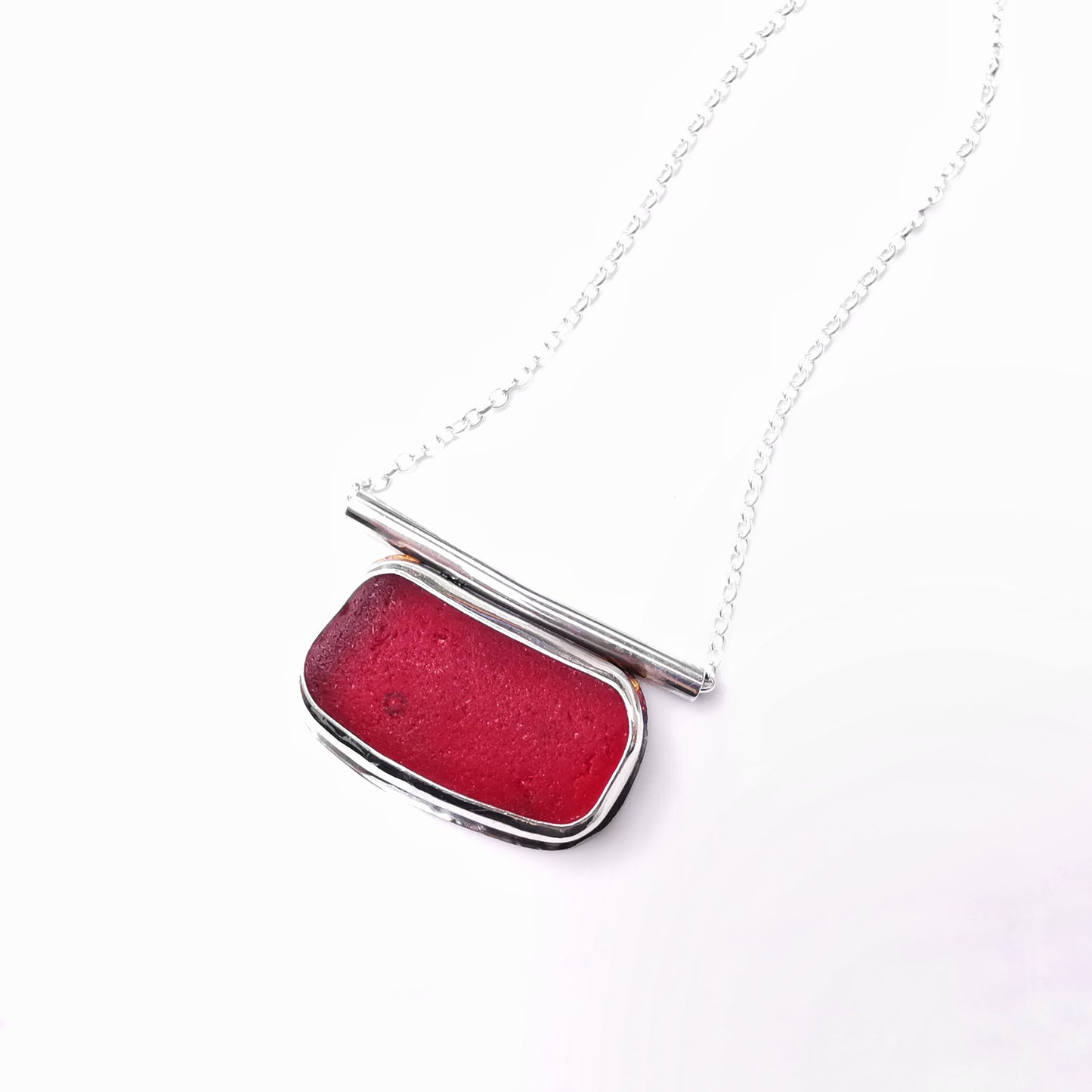 Scottish red sea glass & sterling silver pendant.