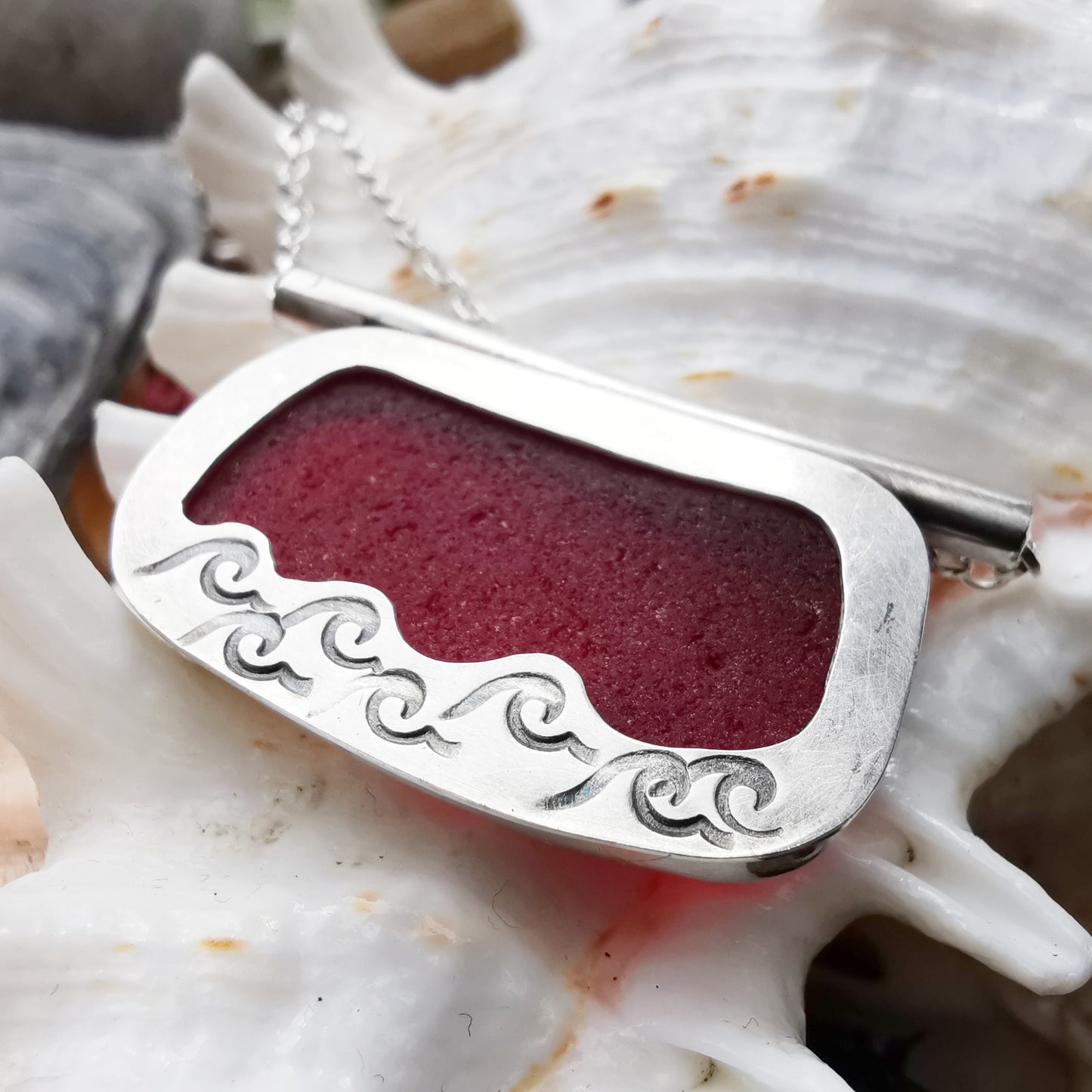 Scottish red sea glass & sterling silver pendant.