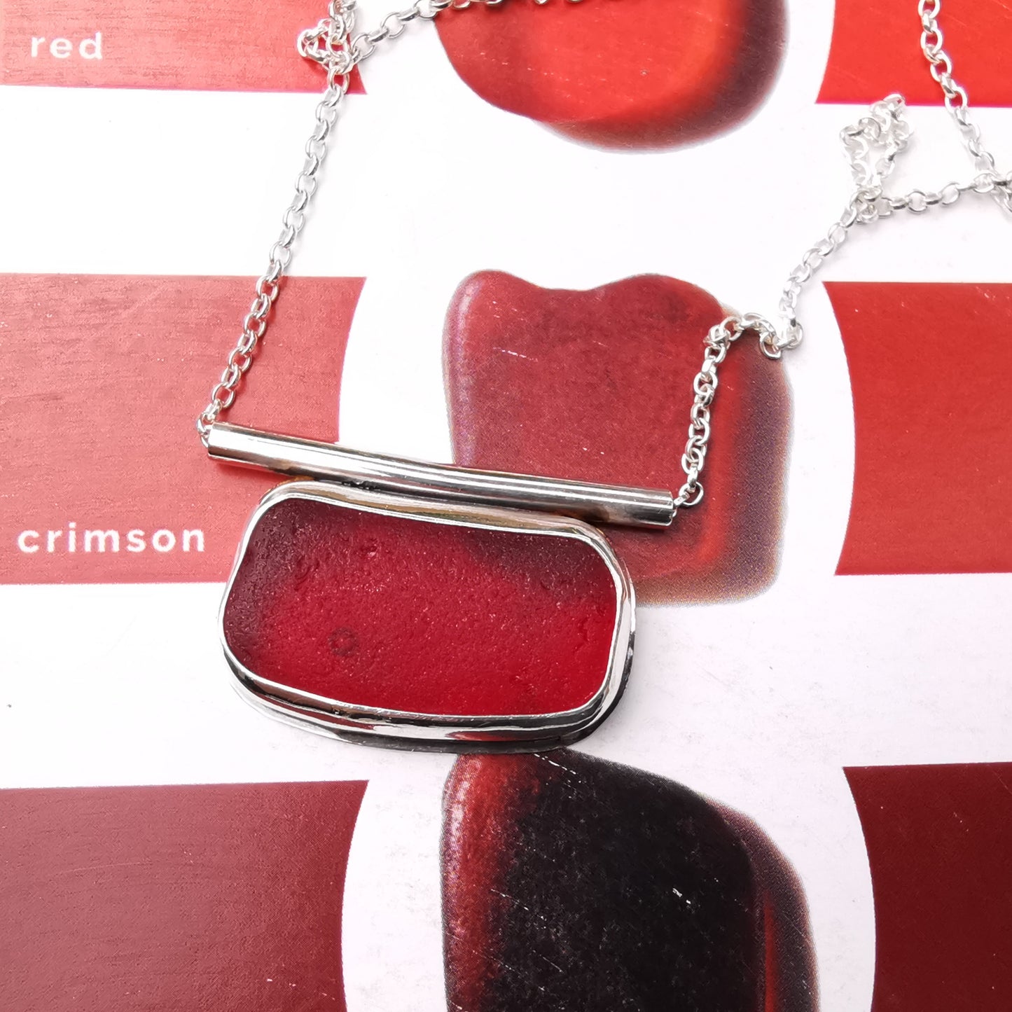 Scottish red sea glass & sterling silver pendant.