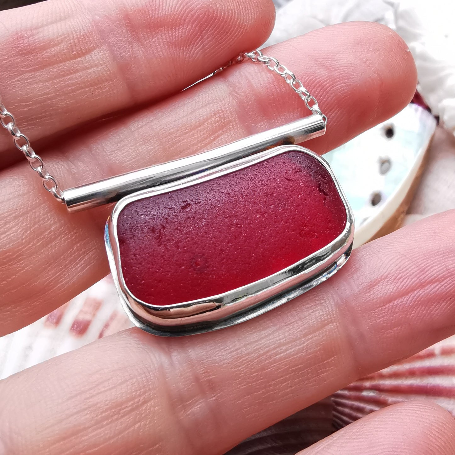 Scottish red sea glass & sterling silver pendant.