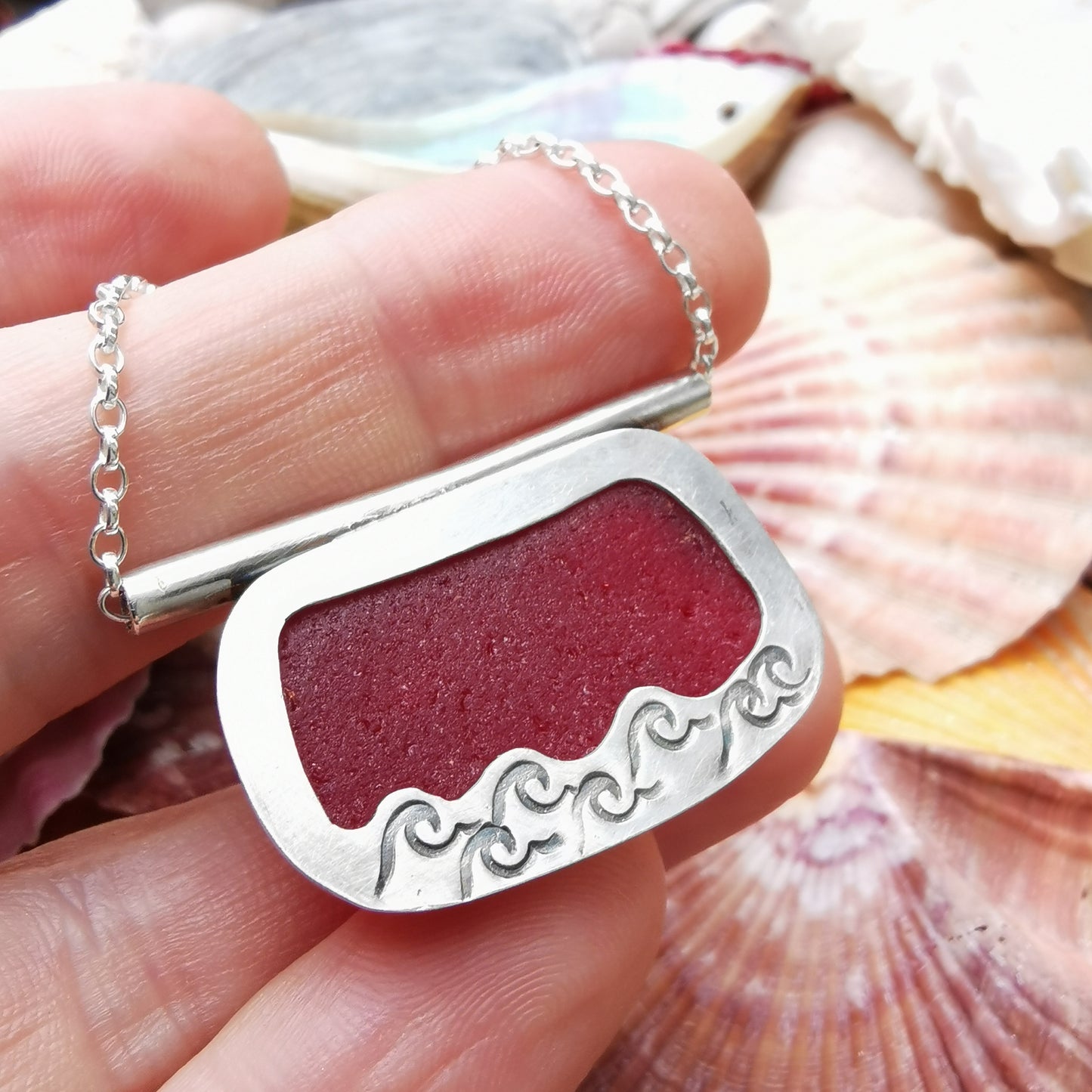 Scottish red sea glass & sterling silver pendant.