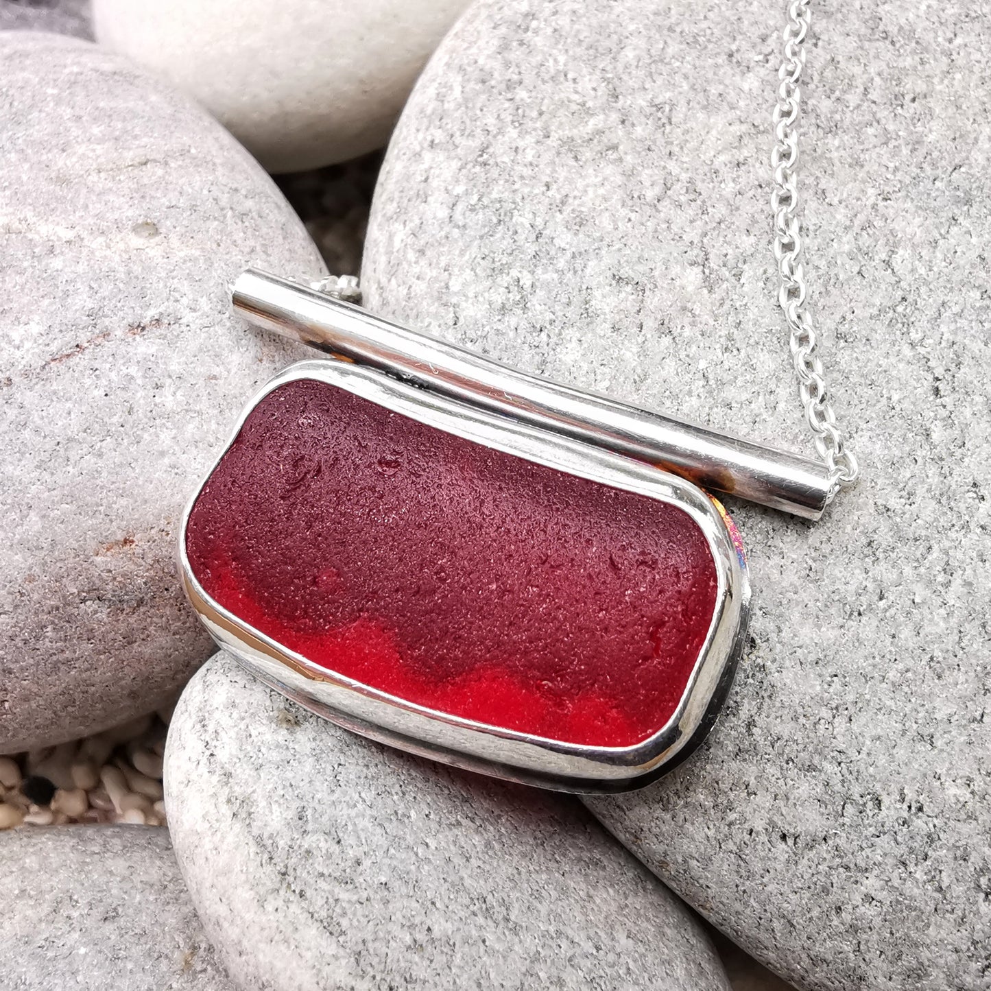 Scottish red sea glass & sterling silver pendant.