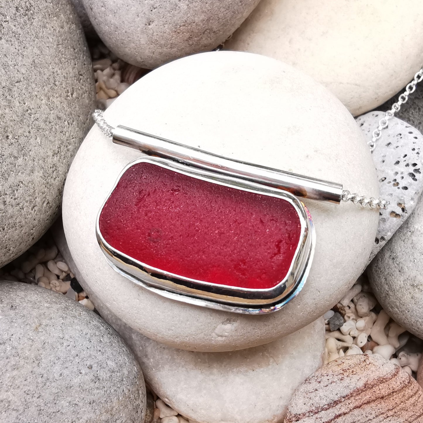 Scottish red sea glass & sterling silver pendant.
