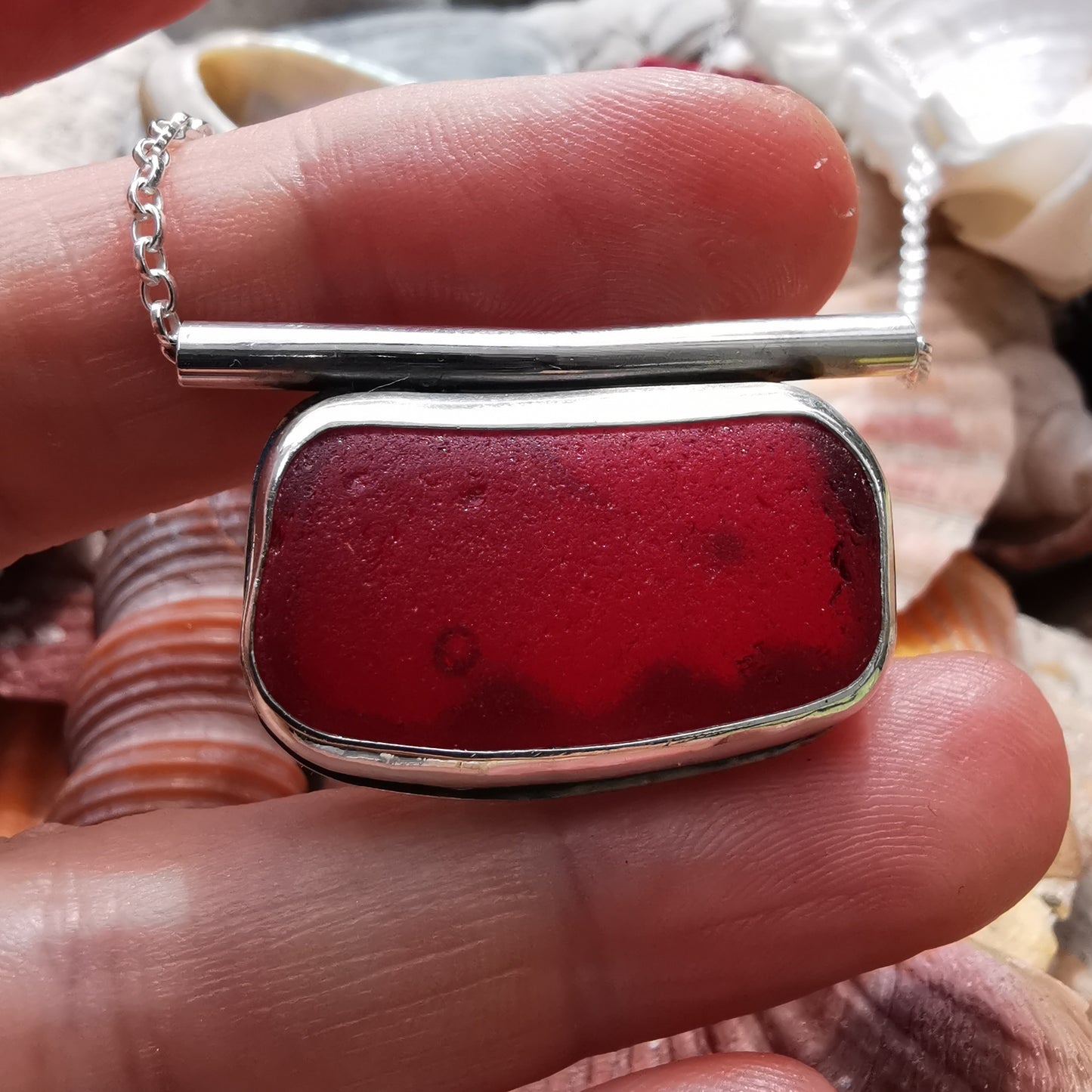Scottish red sea glass & sterling silver pendant.