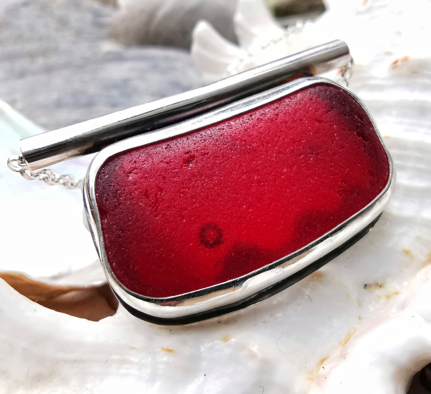 Scottish red sea glass & sterling silver pendant.