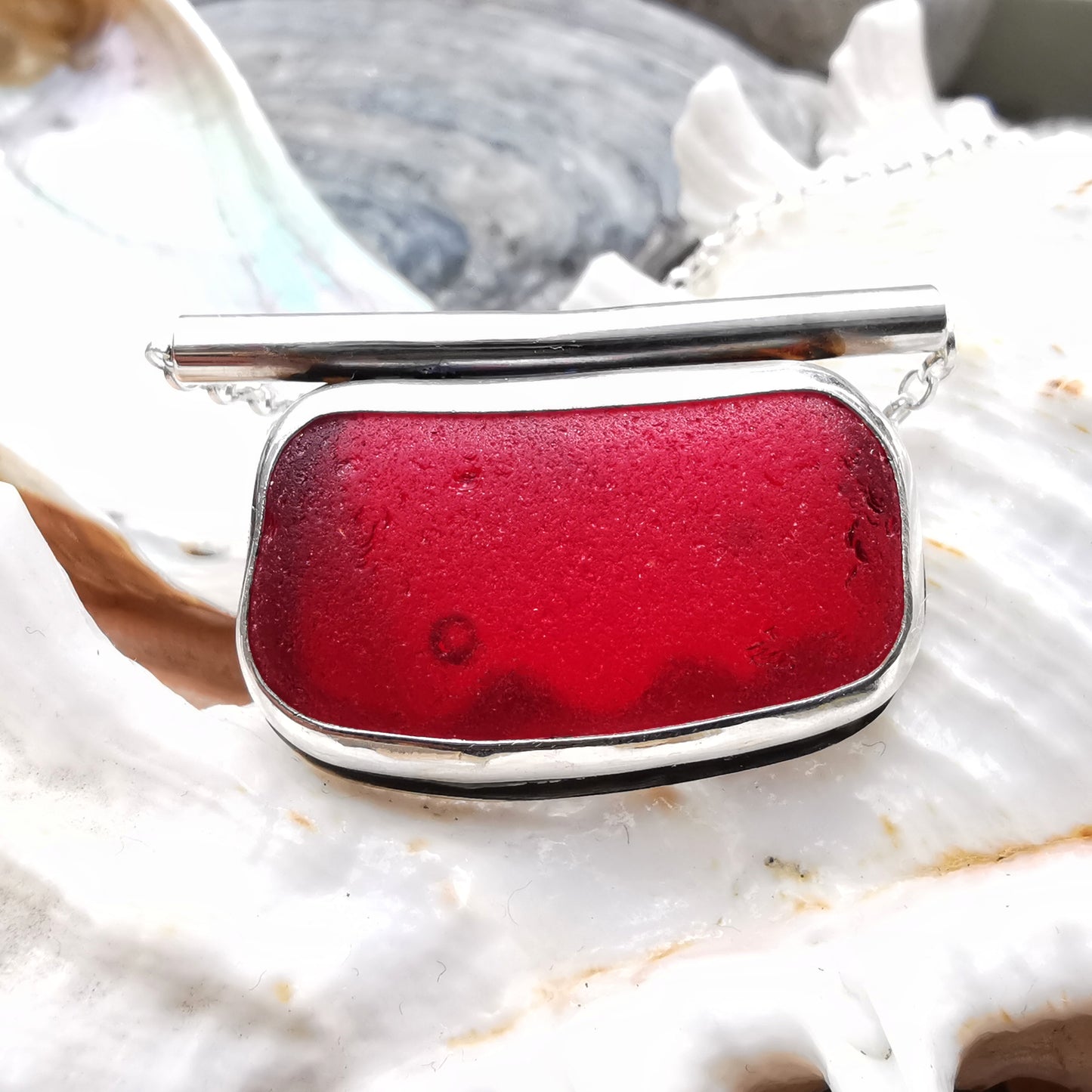 Scottish red sea glass & sterling silver pendant.