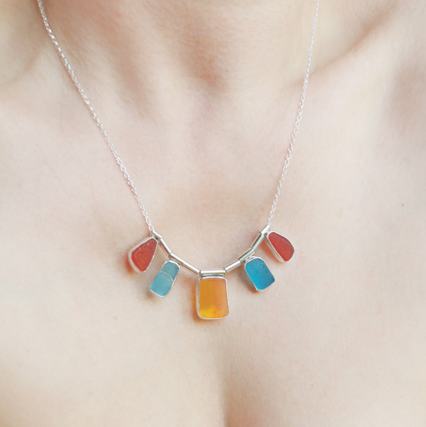 Genuine Scottish orange, red and blue sea glass & sterling silver necklace.