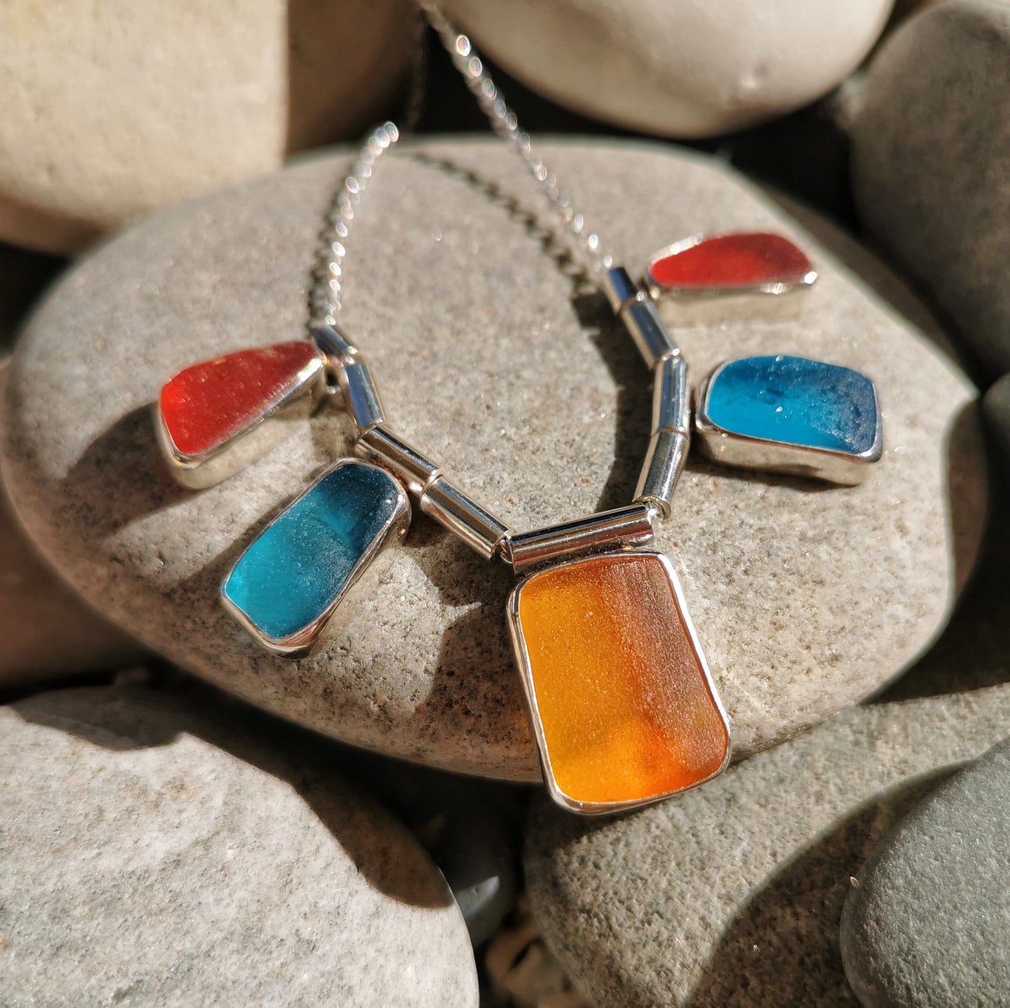 Genuine Scottish orange, red and blue sea glass & sterling silver necklace.