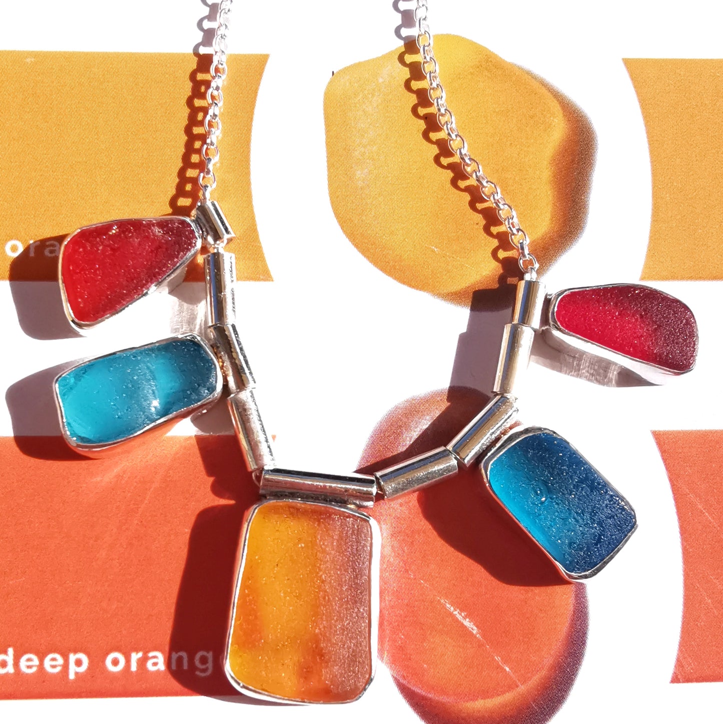 Genuine Scottish orange, red and blue sea glass & sterling silver necklace.
