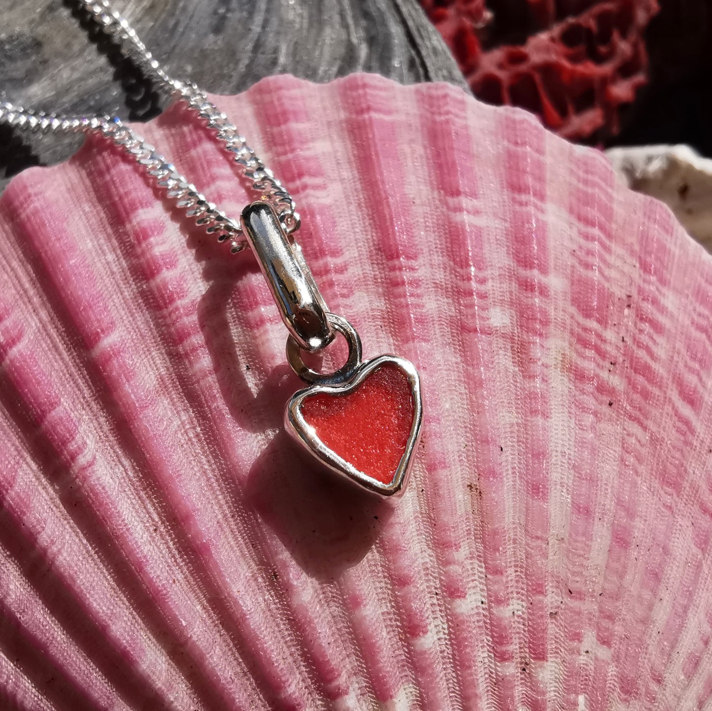 Tiny Scottish red sea glass heart & sterling silver pendant.