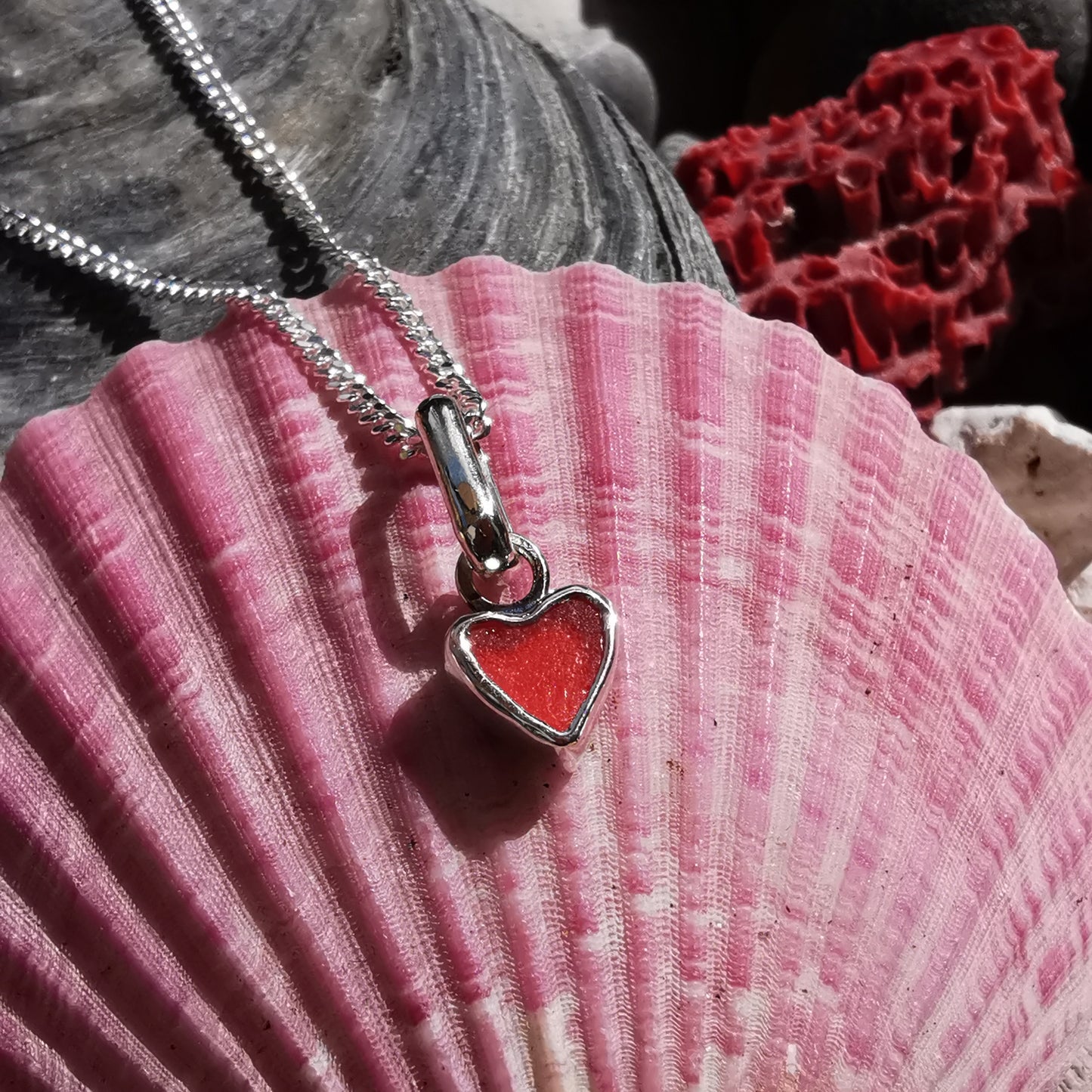 Tiny Scottish red sea glass heart & sterling silver pendant.