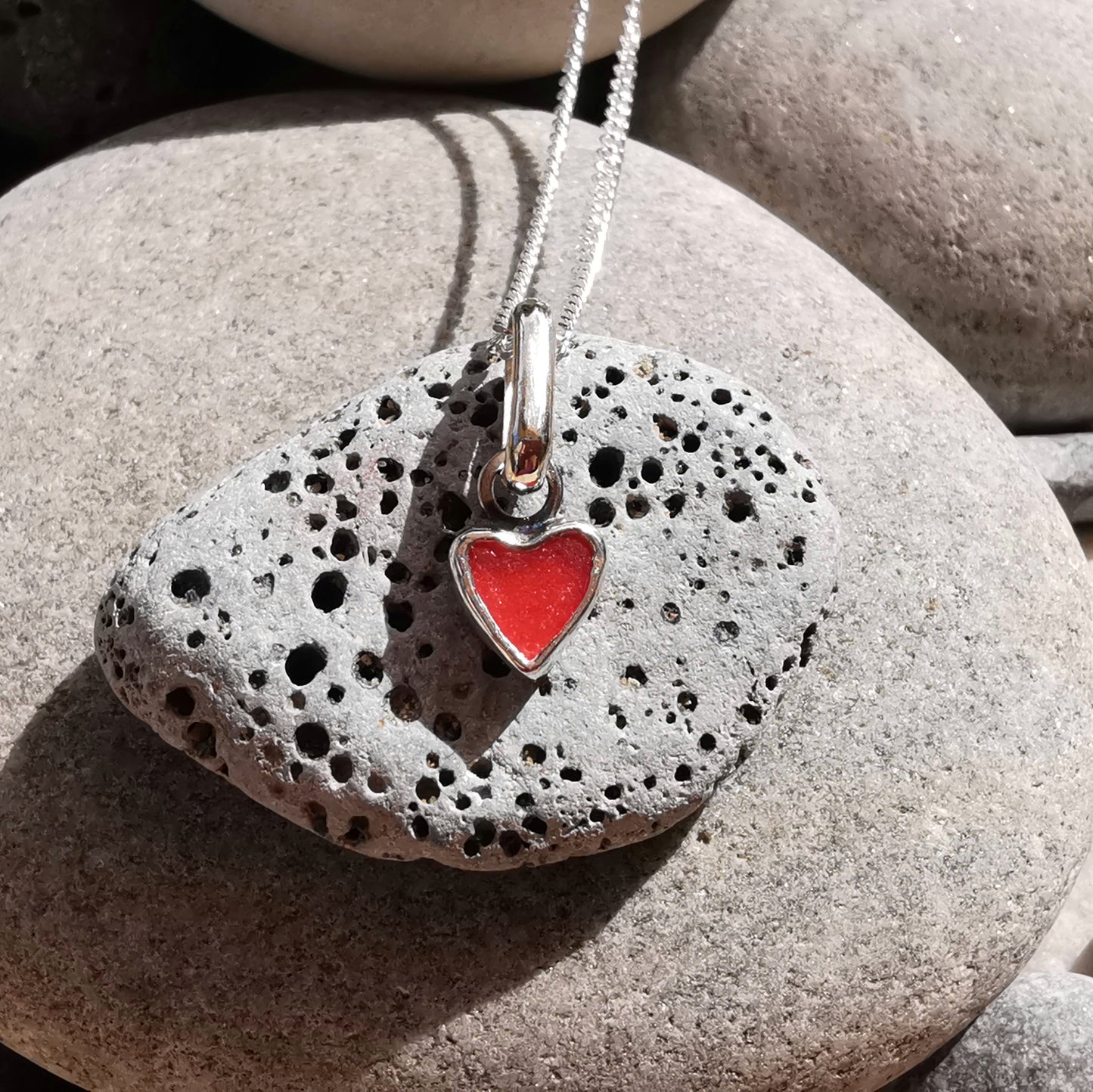 Tiny Scottish red sea glass heart & sterling silver pendant.