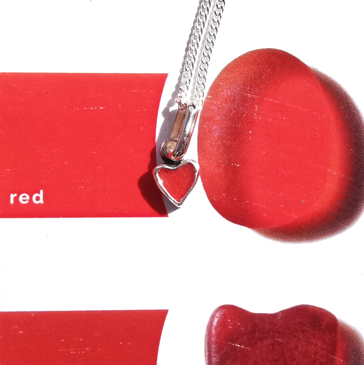 Tiny Scottish red sea glass heart & sterling silver pendant.