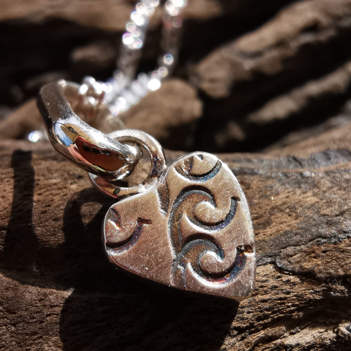 Tiny Scottish red sea glass heart & sterling silver pendant.