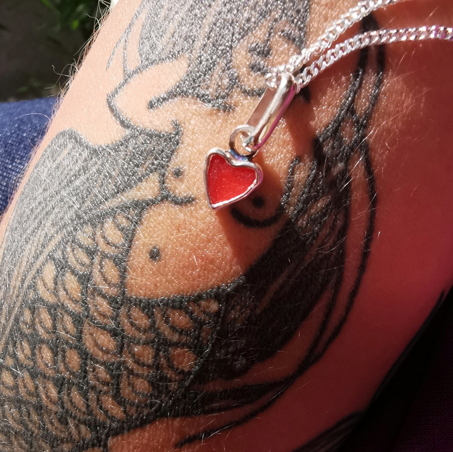 Tiny Scottish red sea glass heart & sterling silver pendant.