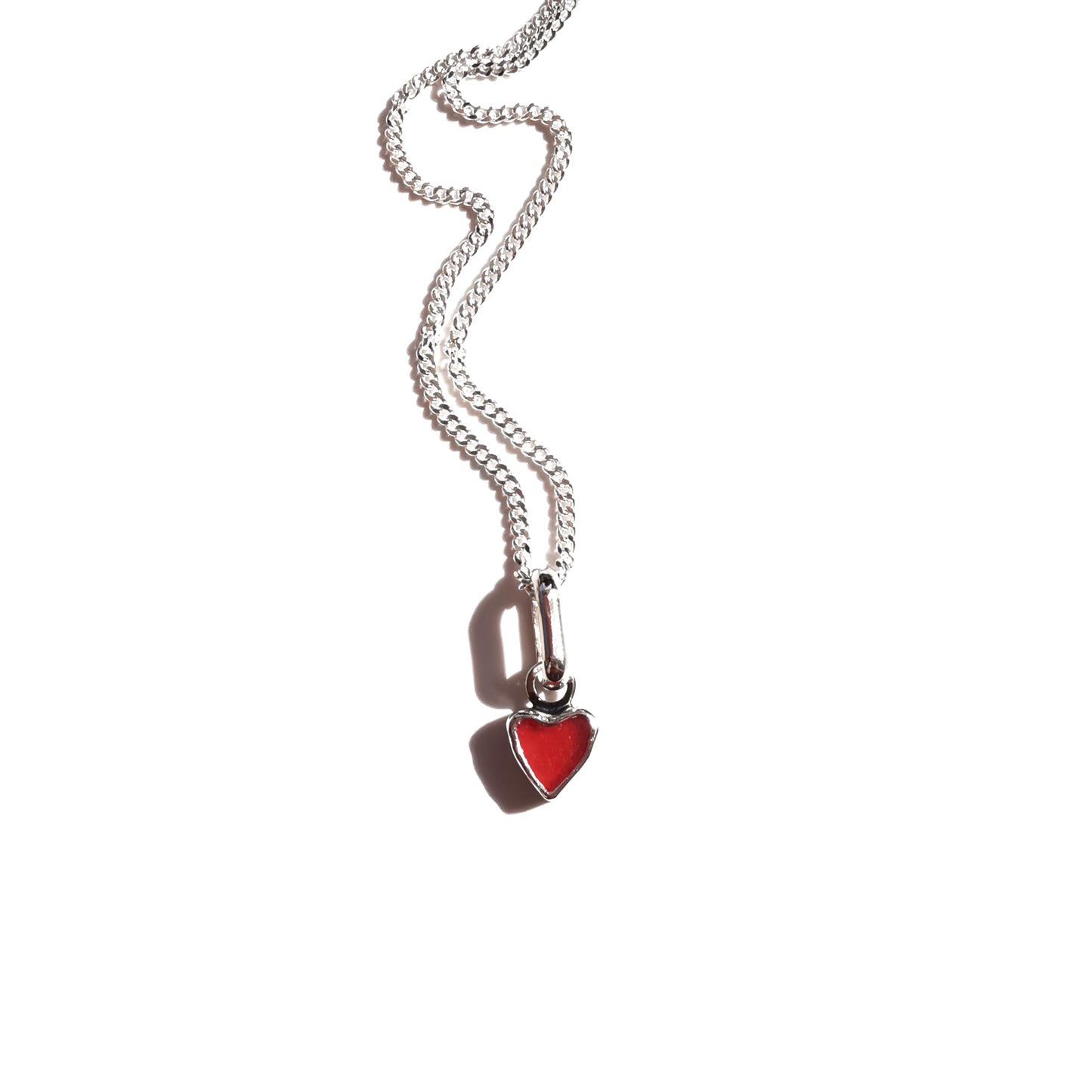 Tiny Scottish red sea glass heart & sterling silver pendant.